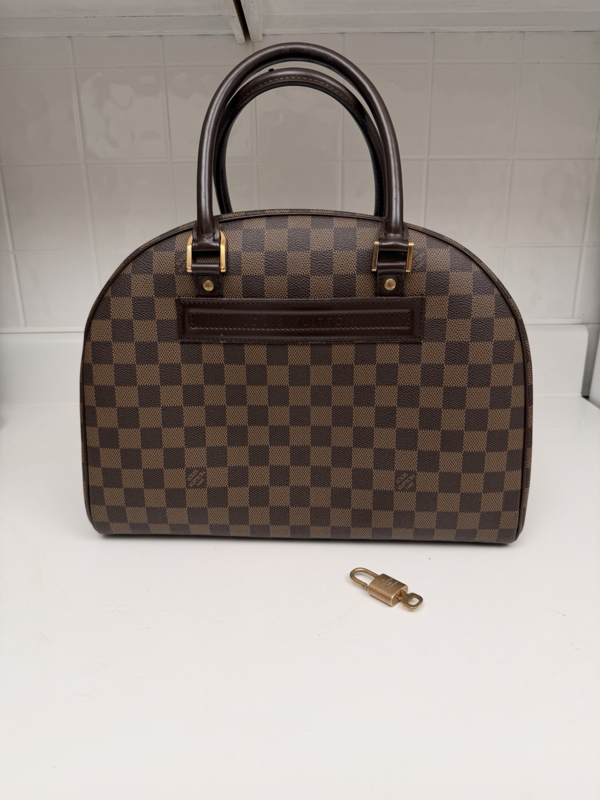 Authentic Louis Vuitton Nolita Damier Ebene Handbag in Brown N41455