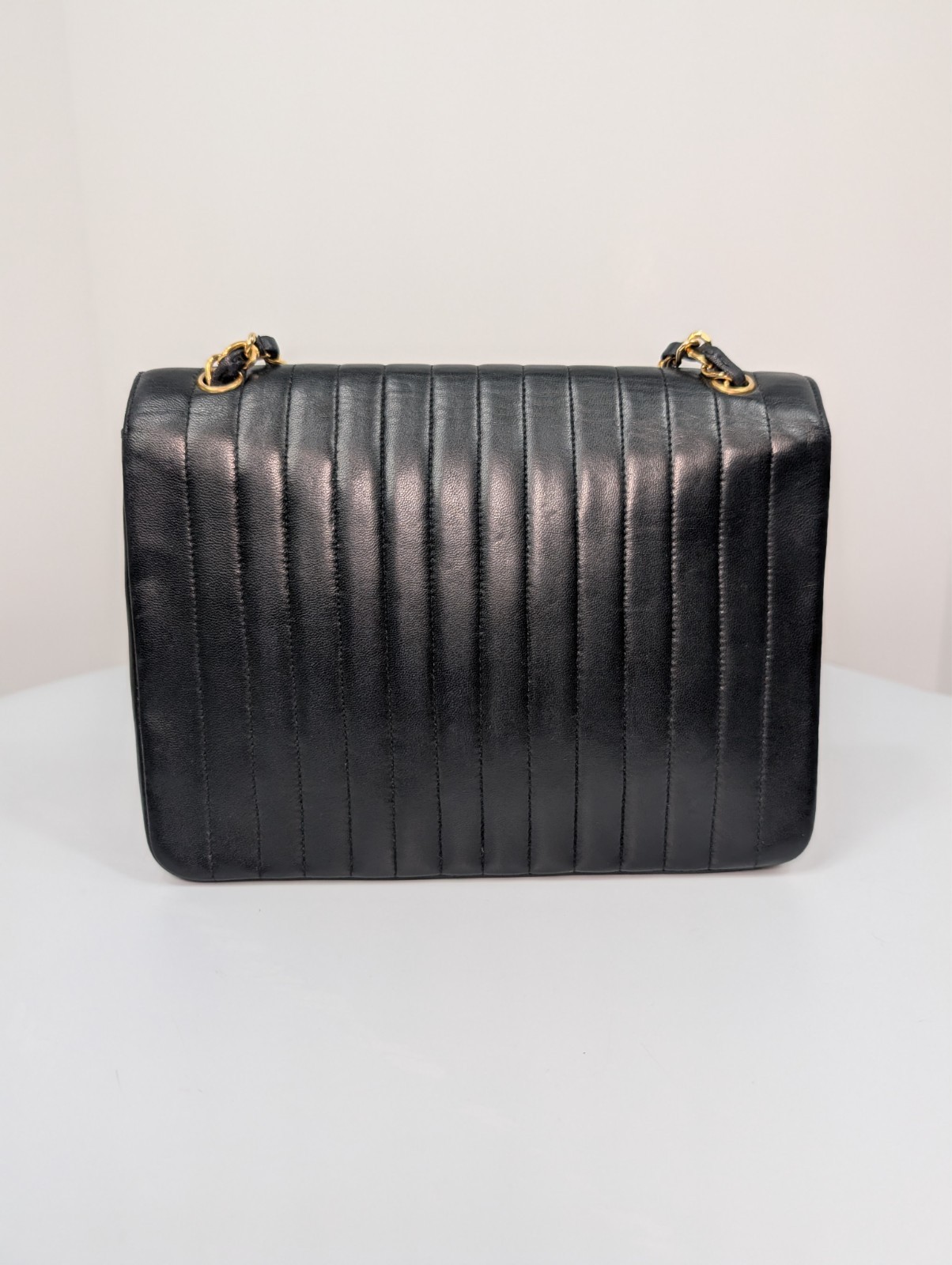 Chanel Vintage Black Vertical Stitch Flap Bag with Circle 24K Gold CC Turn-Lock