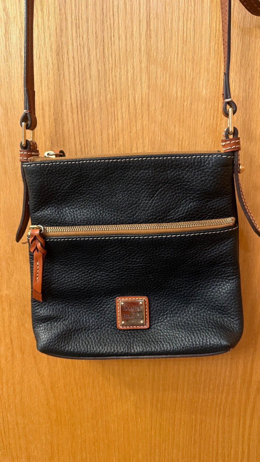 Dooney & Bourke Black Pebble Leather Crossbody Bag with Brown Trim