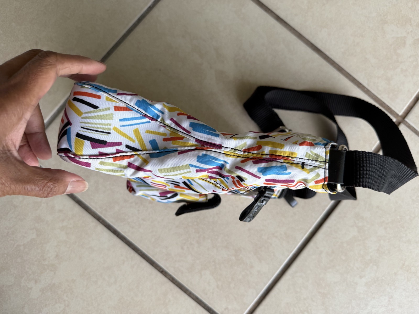 9 & Co. crossbody With outside zip pocket and outside snap pocket