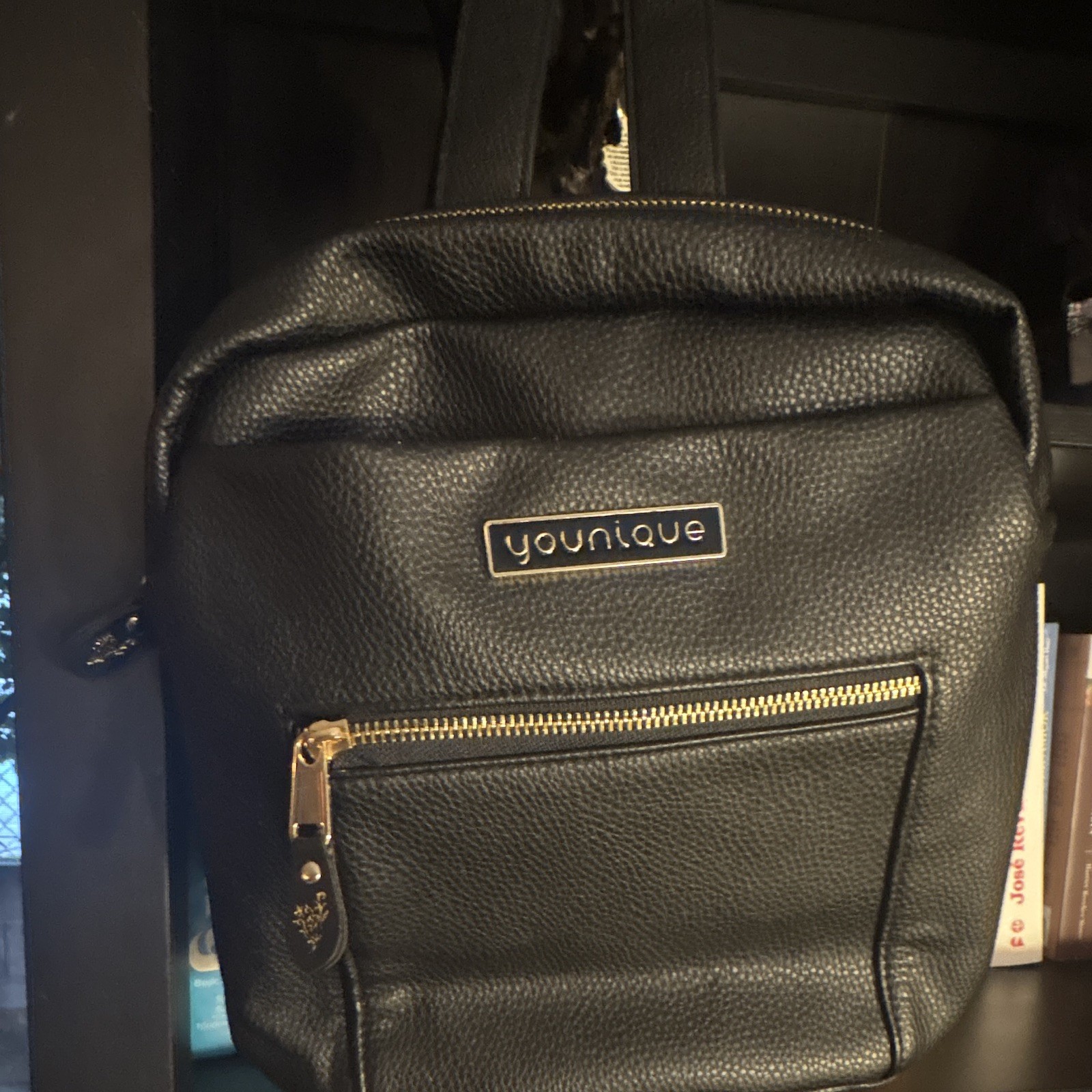 Younique Black Pebbled Backpack with Gold Hardware & Zip, Pockets, Purple Lining