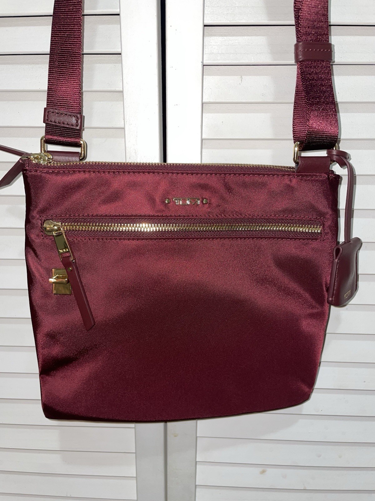 TUMI Voyageur Tula Crossbody Bag Purse Burgundy and Silver 8 x 9 inch