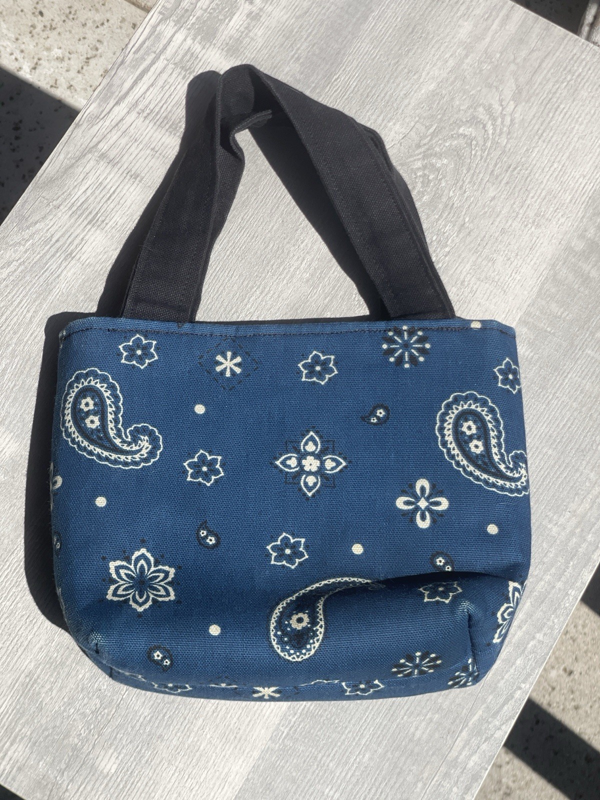 Blue paisley mini tote bag with black straps