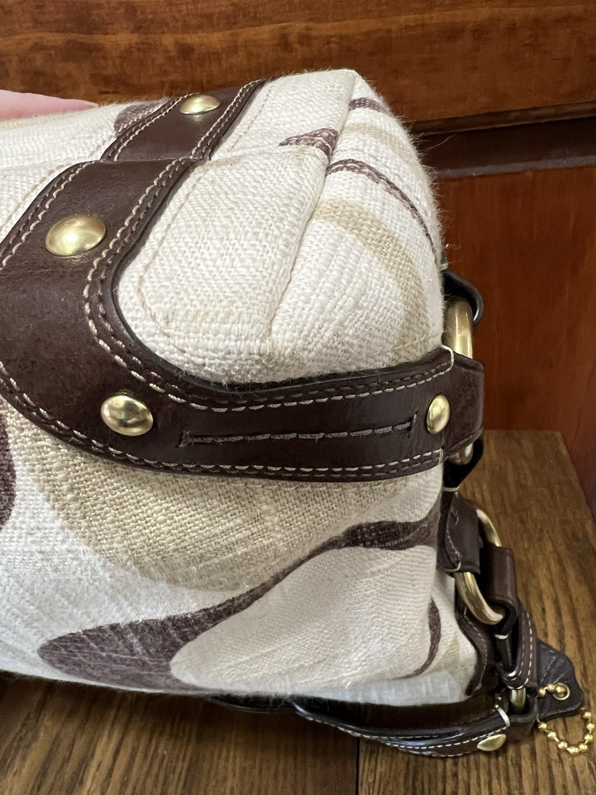 Coach Signature Medium sized Carly with matching wallet.