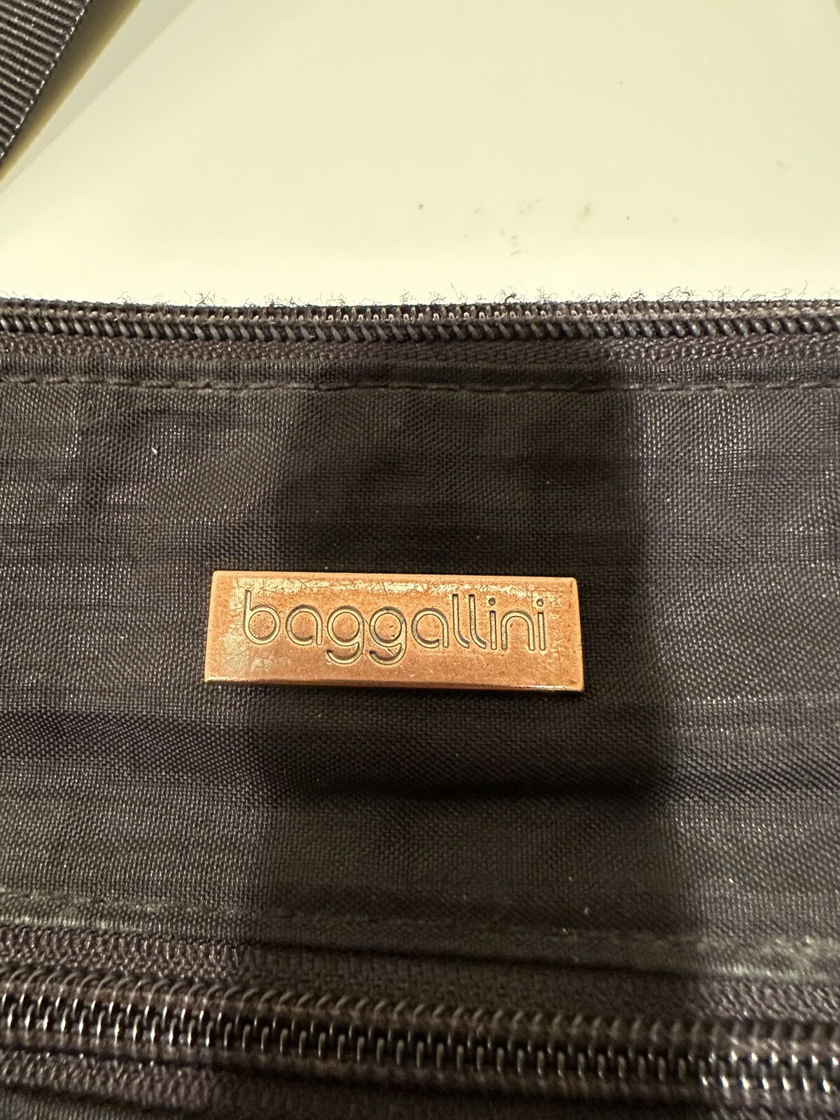Baggallini black crossbody Purse Quilted Pocket On Front Pocket On Back