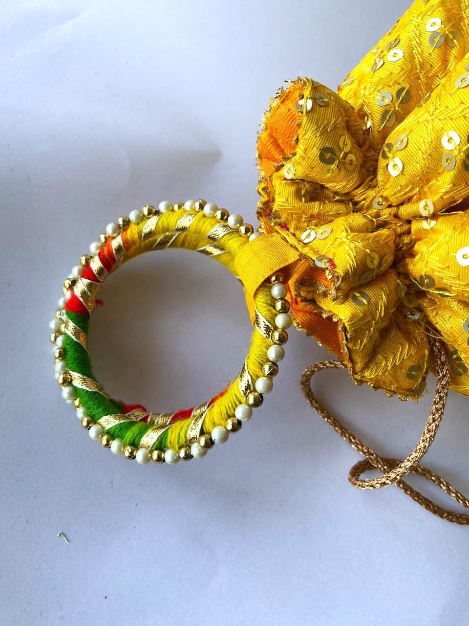Indian Sequence Embroidered Work Cylinder Potli with Multicolor Latkan & Handle