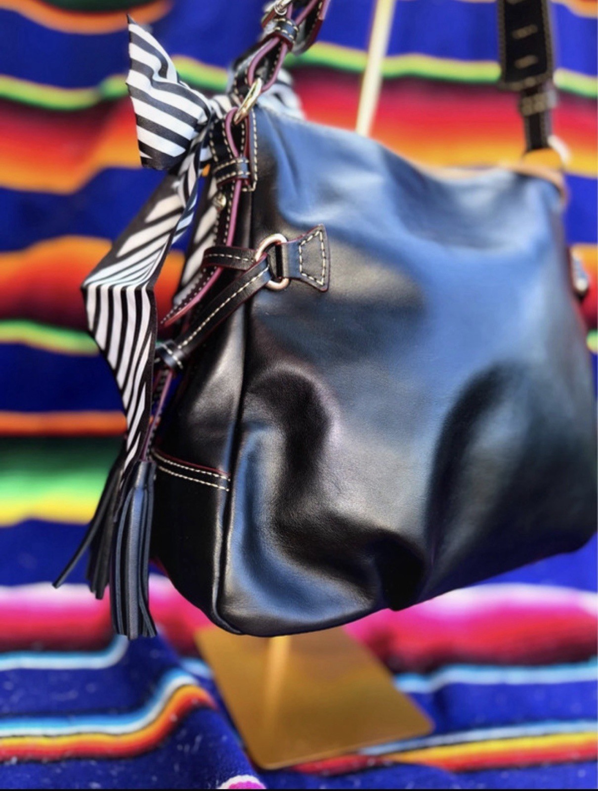 Dooney & Bourke Black Shoulder Bag. Charms included.