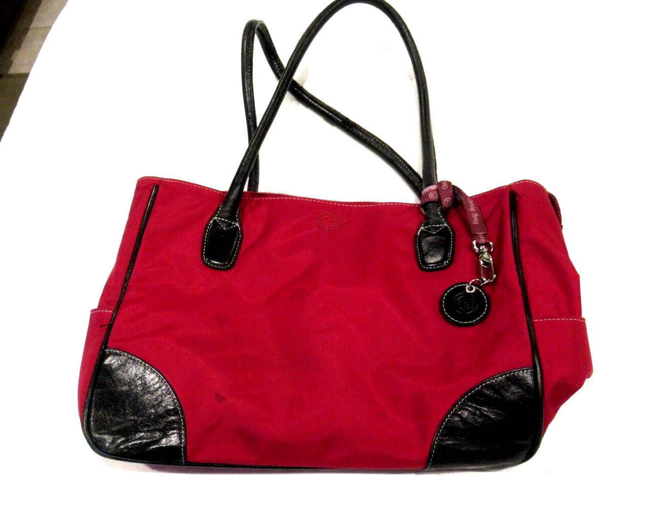 Chelsey Henry red purse with black trim, lots of pockets