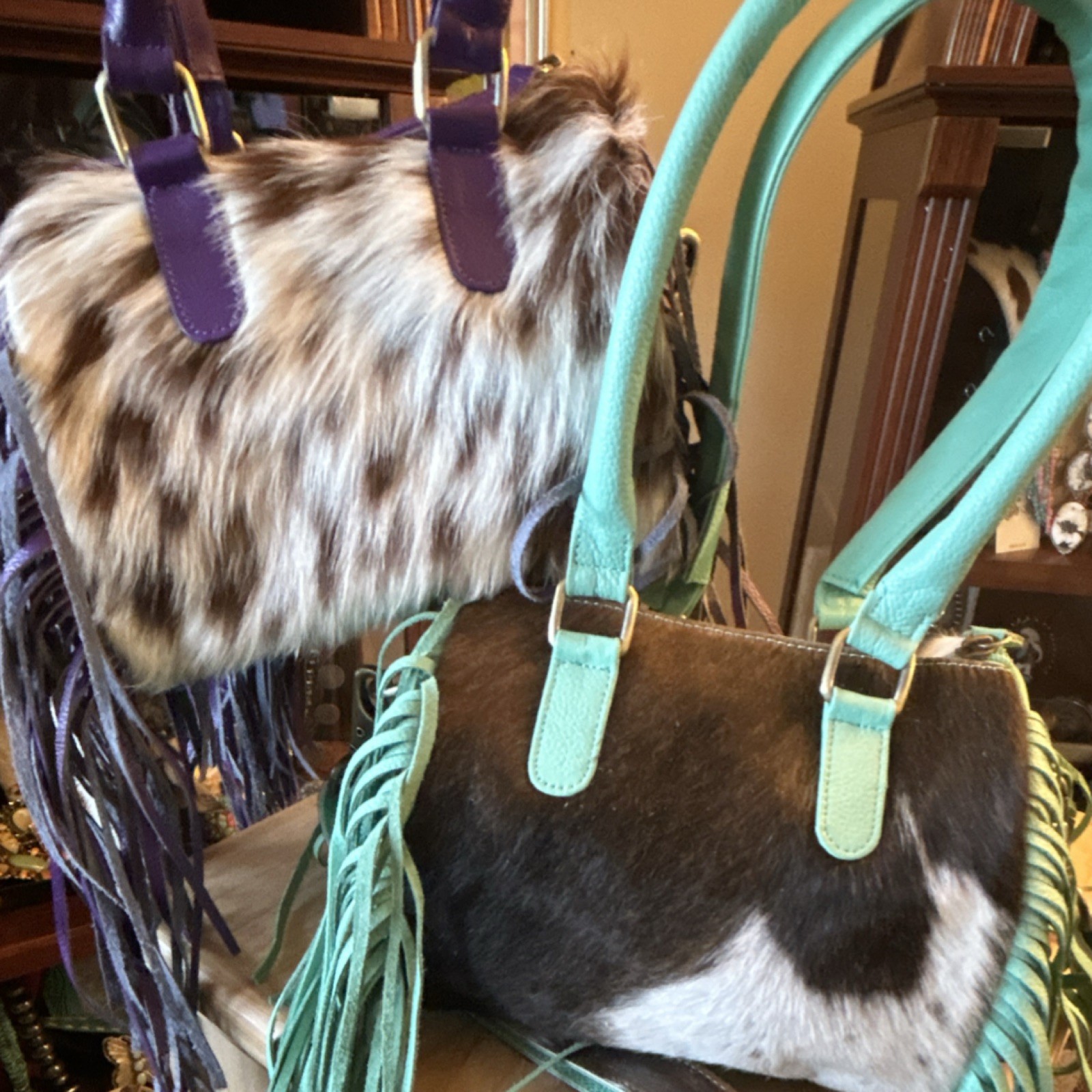 Women’s Western Turquoise mini hide speedy.
