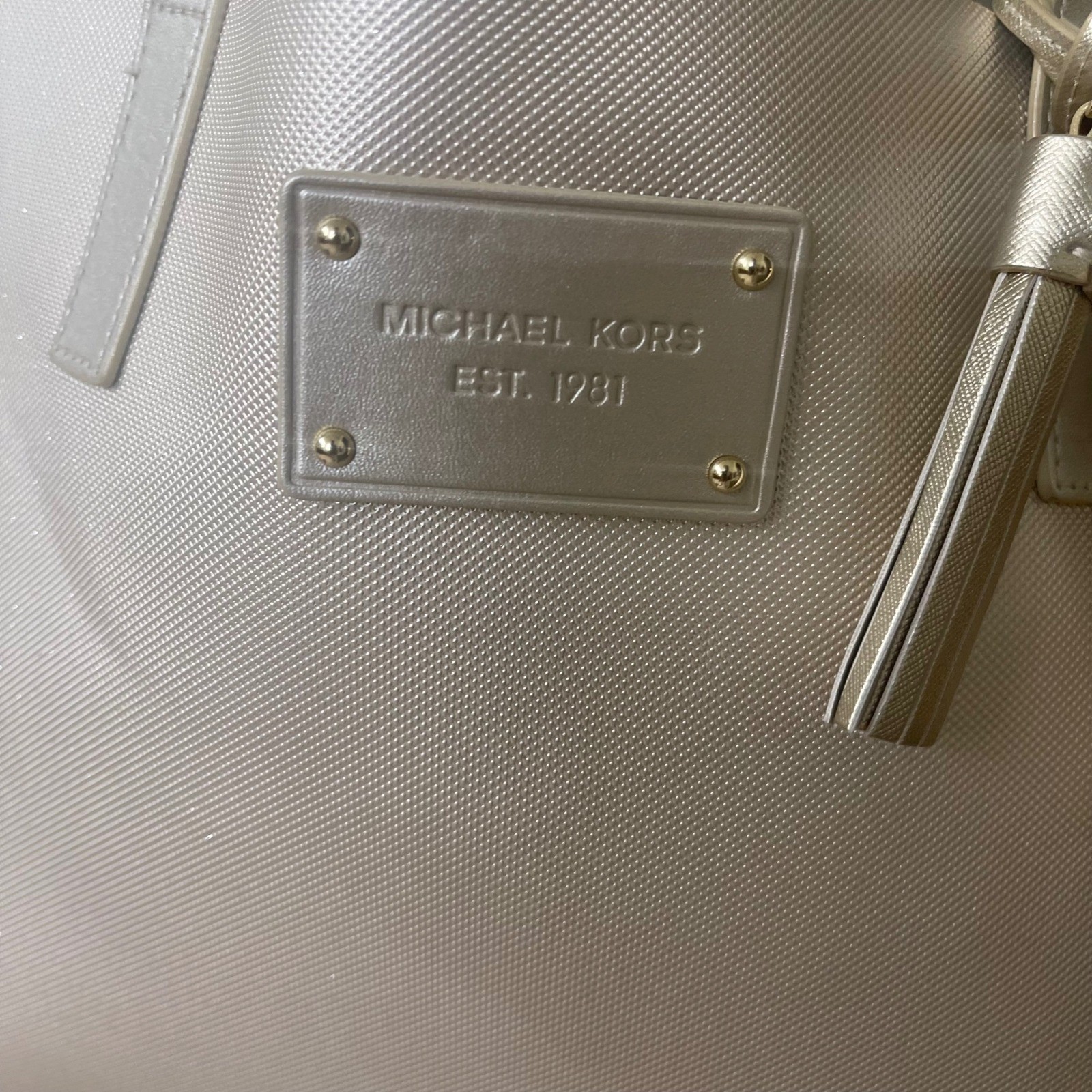 Michael Kors Metallic Gold Tote Bag Double Tassel Logo Plate faux leather euc