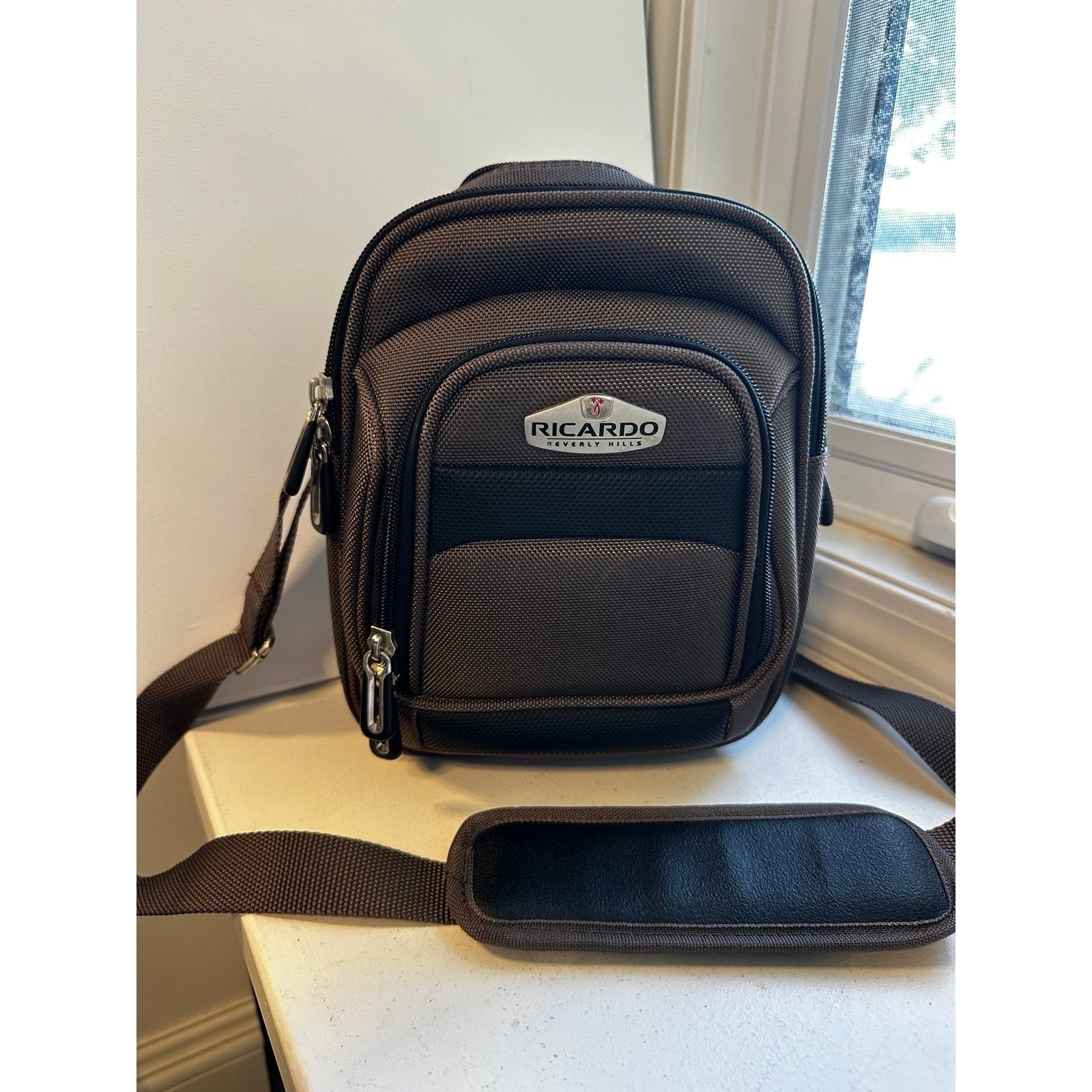 Ricardo Beverly Hills brown small sling backpack high end luxury