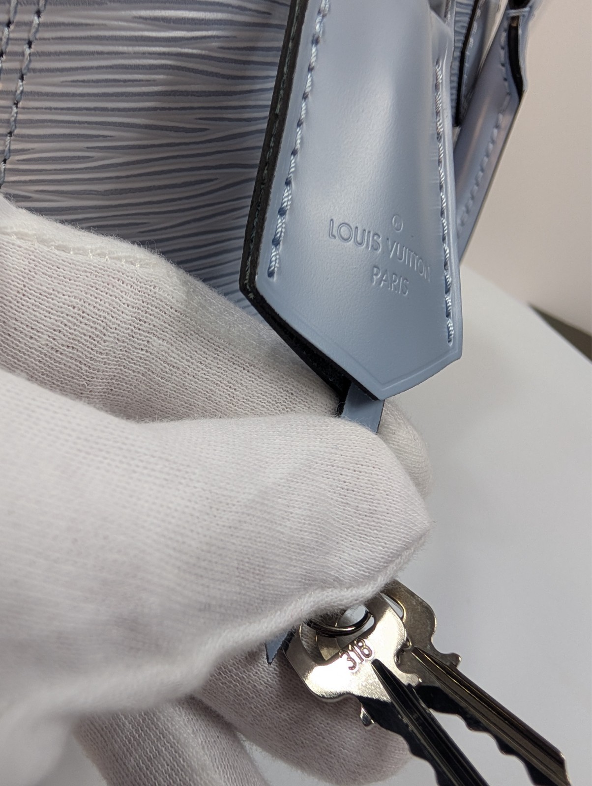 Authenticated Louis Vuitton Bleu Nuage Epi Leather Alma BB Bag