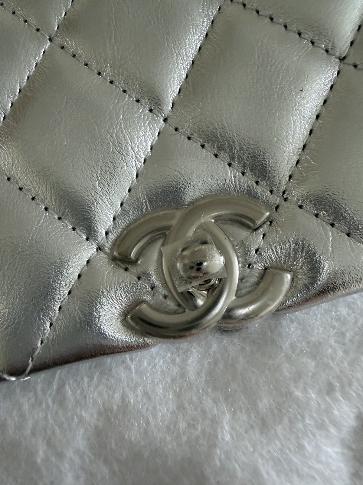 AUTHENTIC CHANEL 25p flap bag in silver