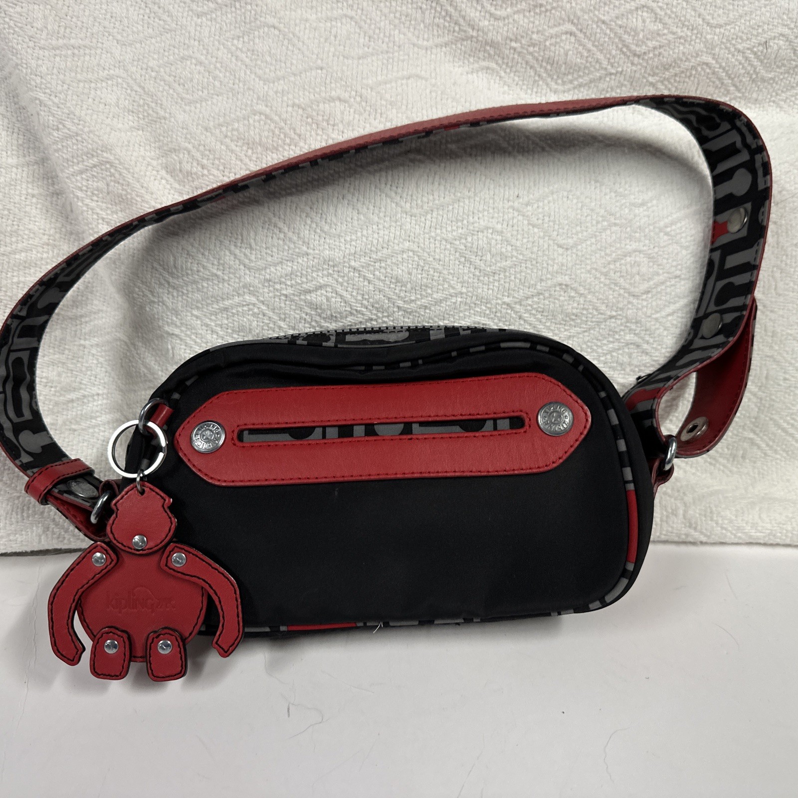 Kipling Bag Rare with leather trim Red, Gray and black With Monkey! Excellent