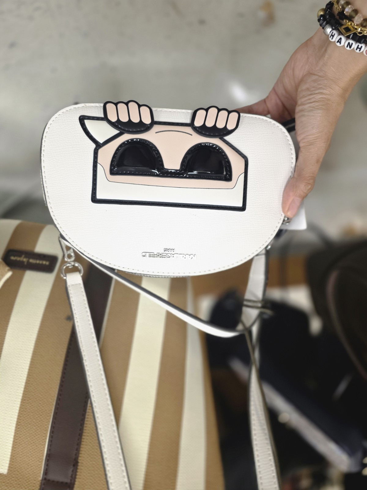 Karl Lagerfeld Paris K/Ikonik Peek-A-Boo Half-Moon Crossbody Bag