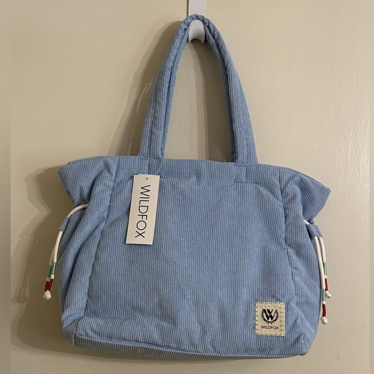 WILDFOX Light Blue Tote Bag Zip Top Lined Inner Pockets Detachable Strap