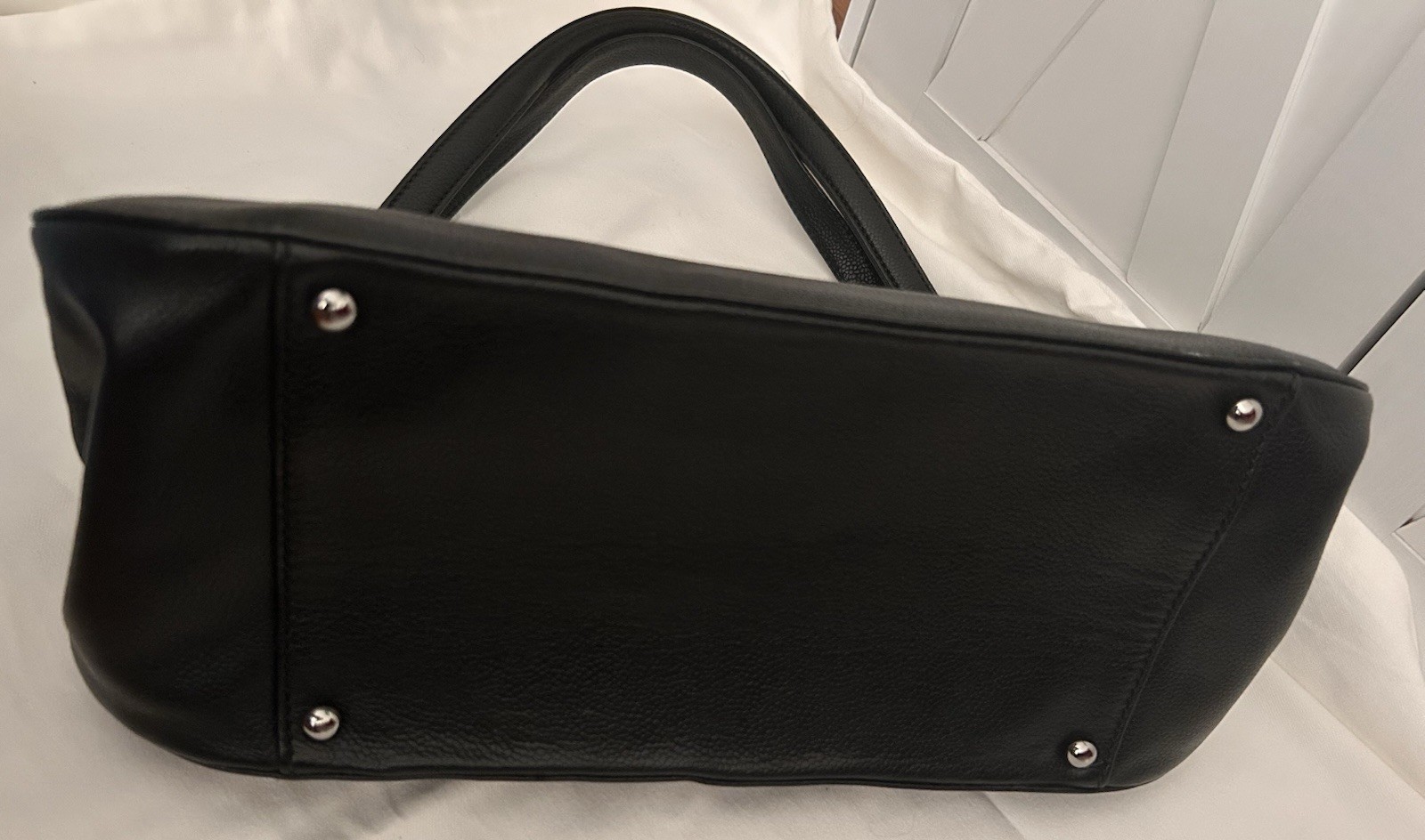 CHANEL Black Quilted Shoulder Bag with Turn Lock & Silver Hardware