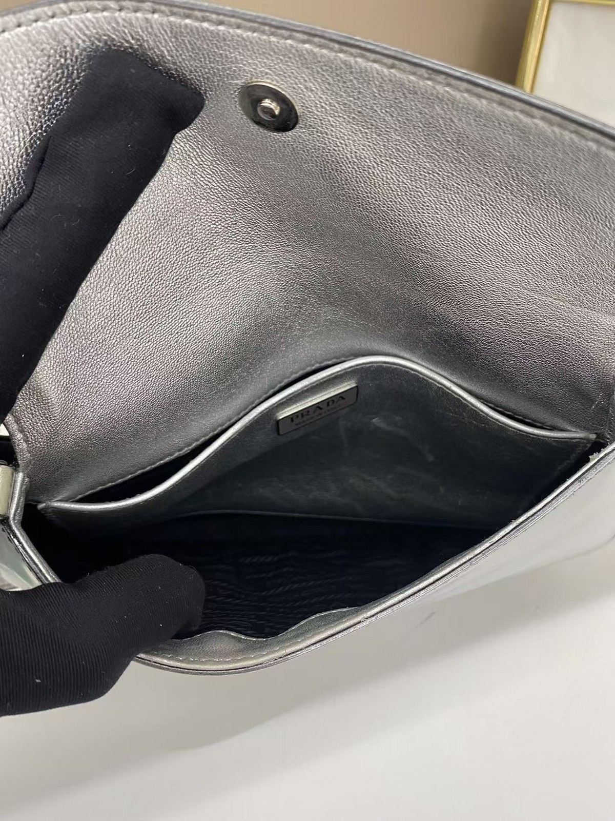 Authentic Prada Cleo shoulder bag in metallic silver leather