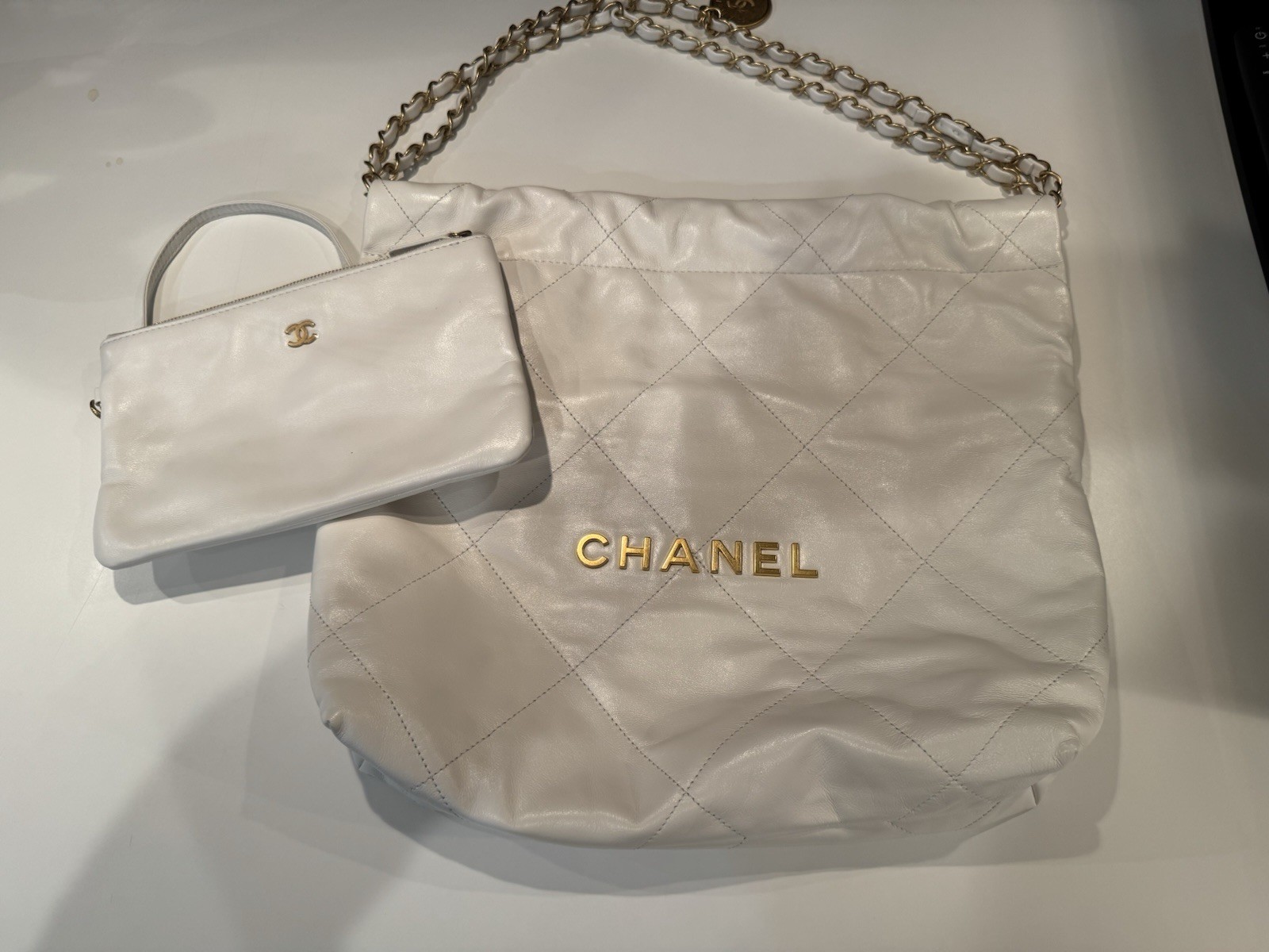 Authentic CHANEL 22 White Calfskin Leather Bag With Gold Hardware