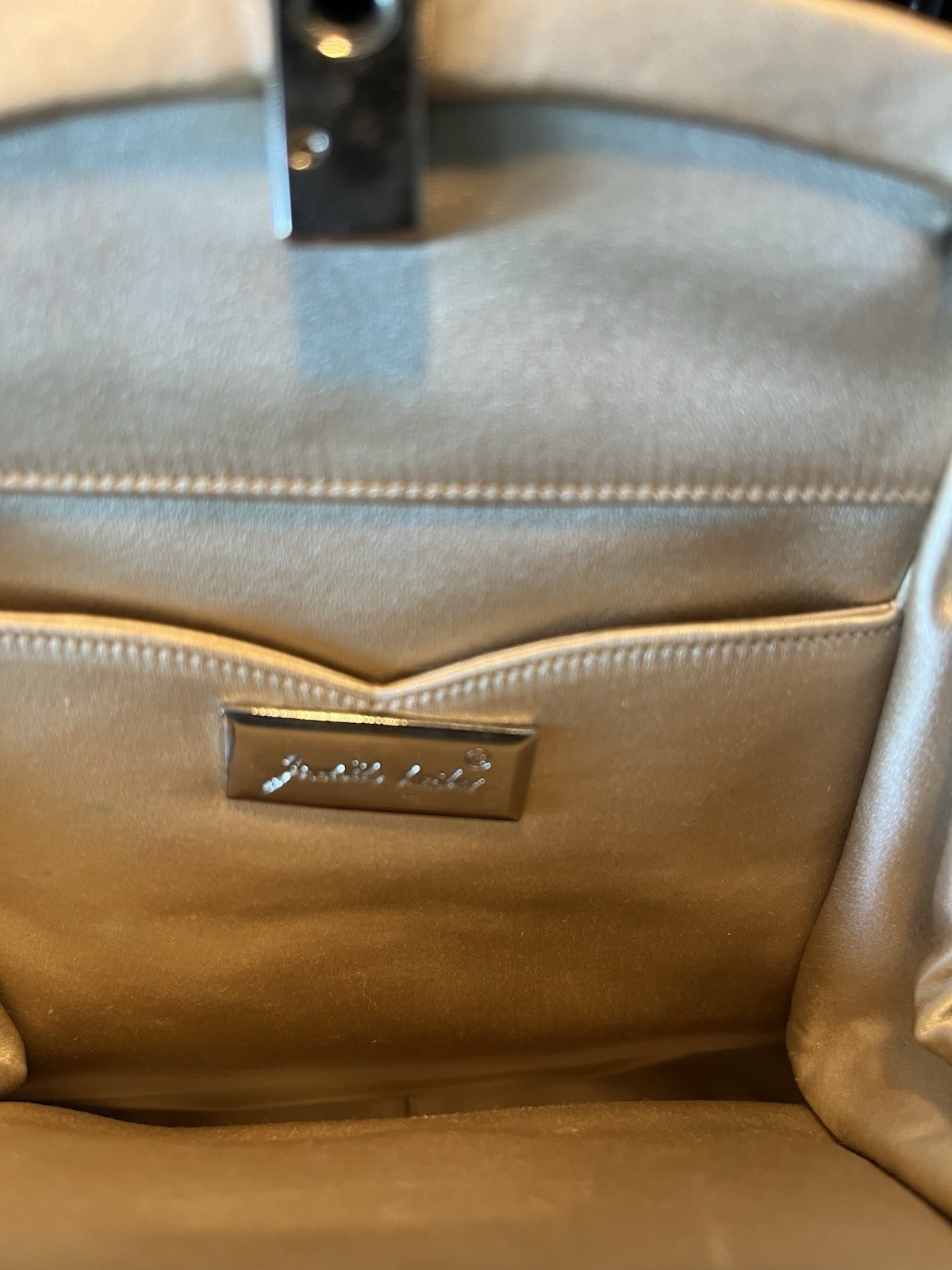 Vintage Judith Leiber satin evening clutch with Sparkling embellishments.