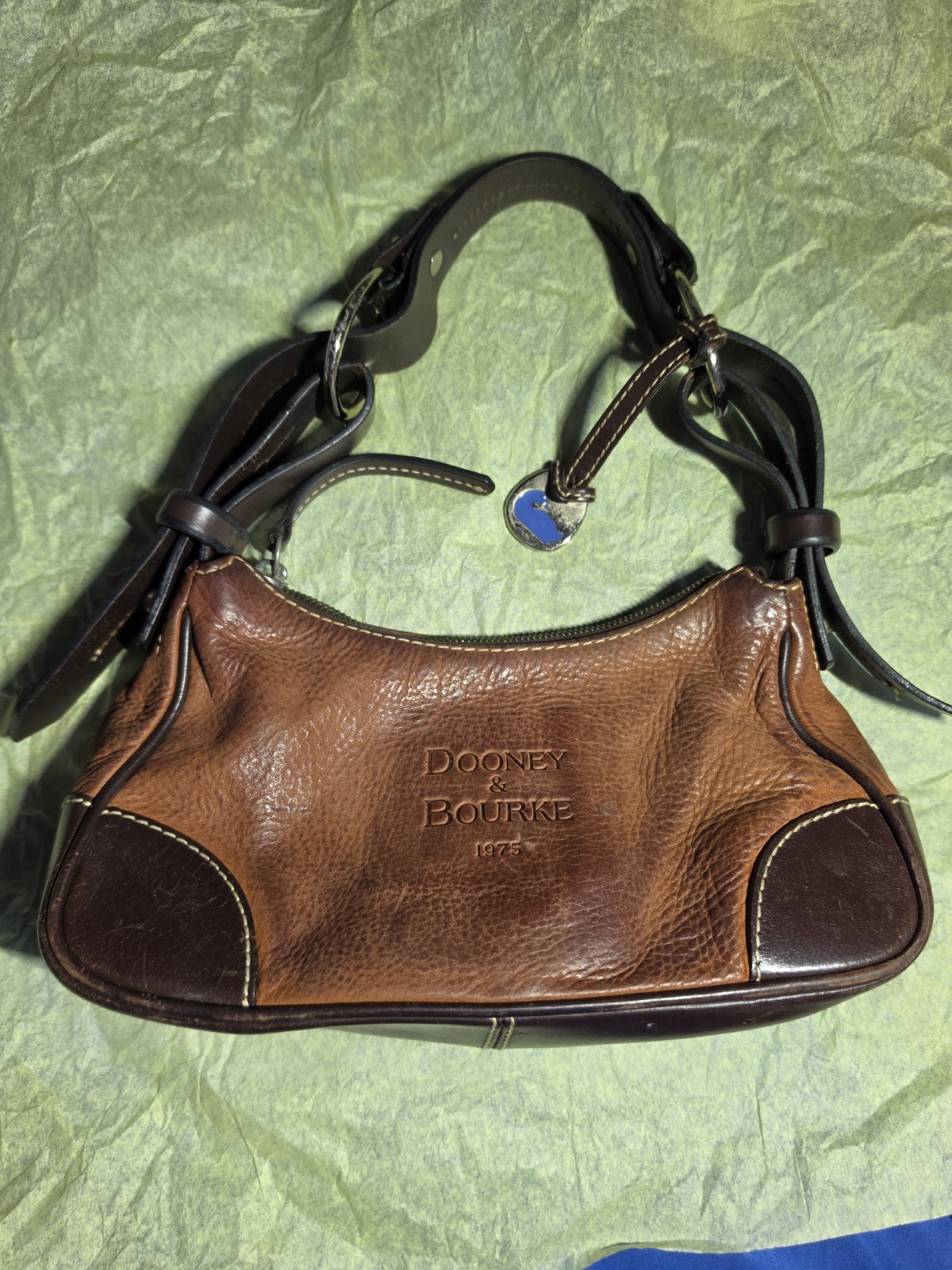 Dooney & Bourke Pebbled Brown Shoulder Bag with Logo Charm, Contrast Stitching