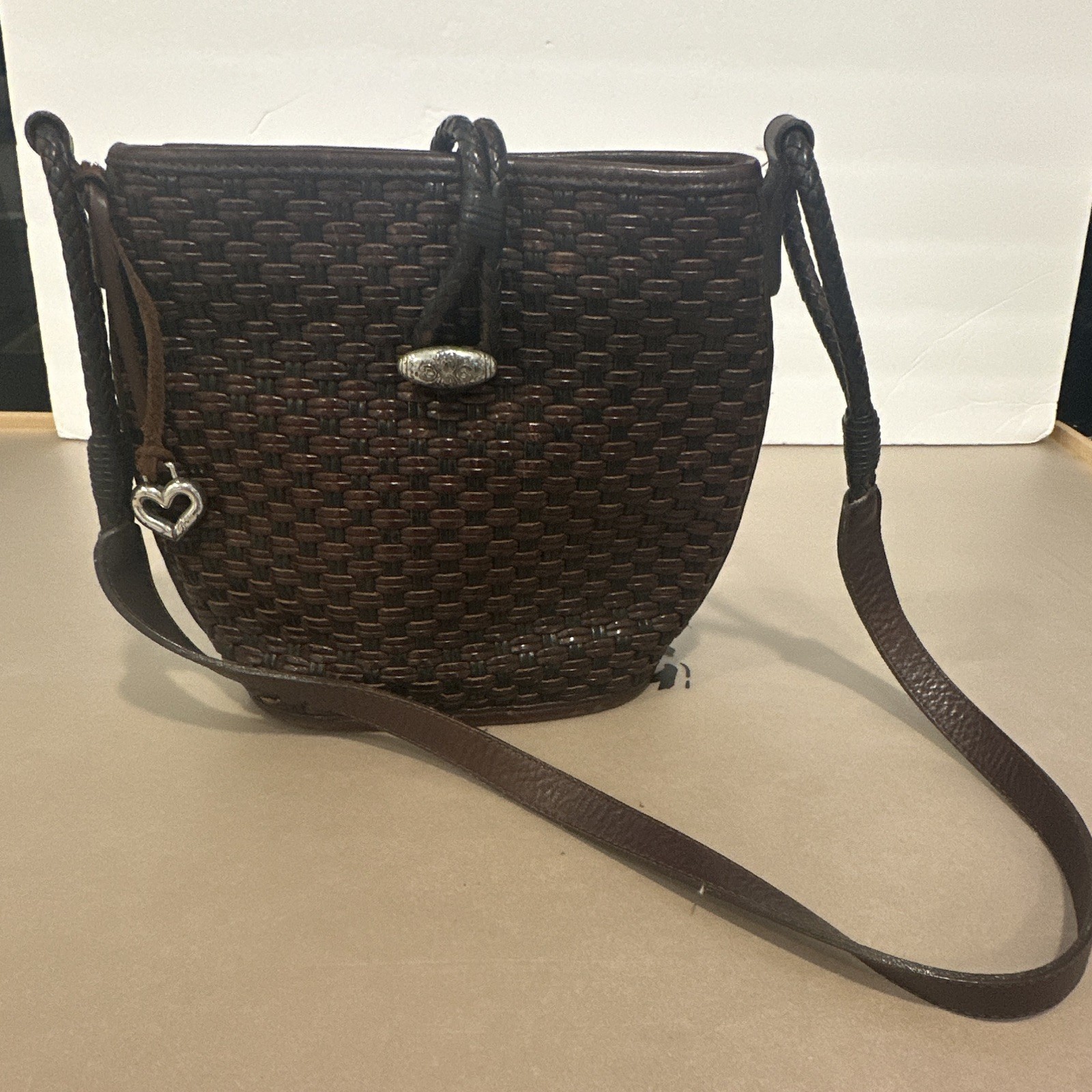 Women’s Brown Woven Bucket Crossbody Bag Heart Charm Snap Closure Medium
