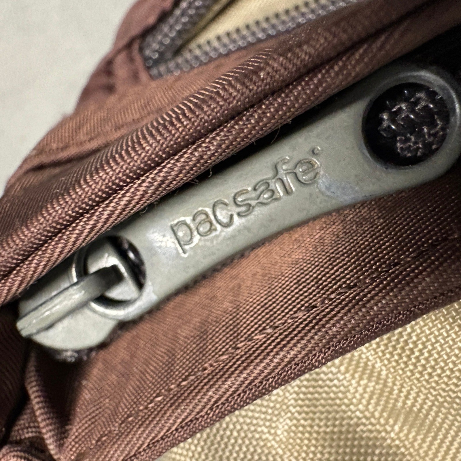 PACSAFE SlingSafe 100 Exomesh Anti-Theft Safety Crossbody Bag in Brown