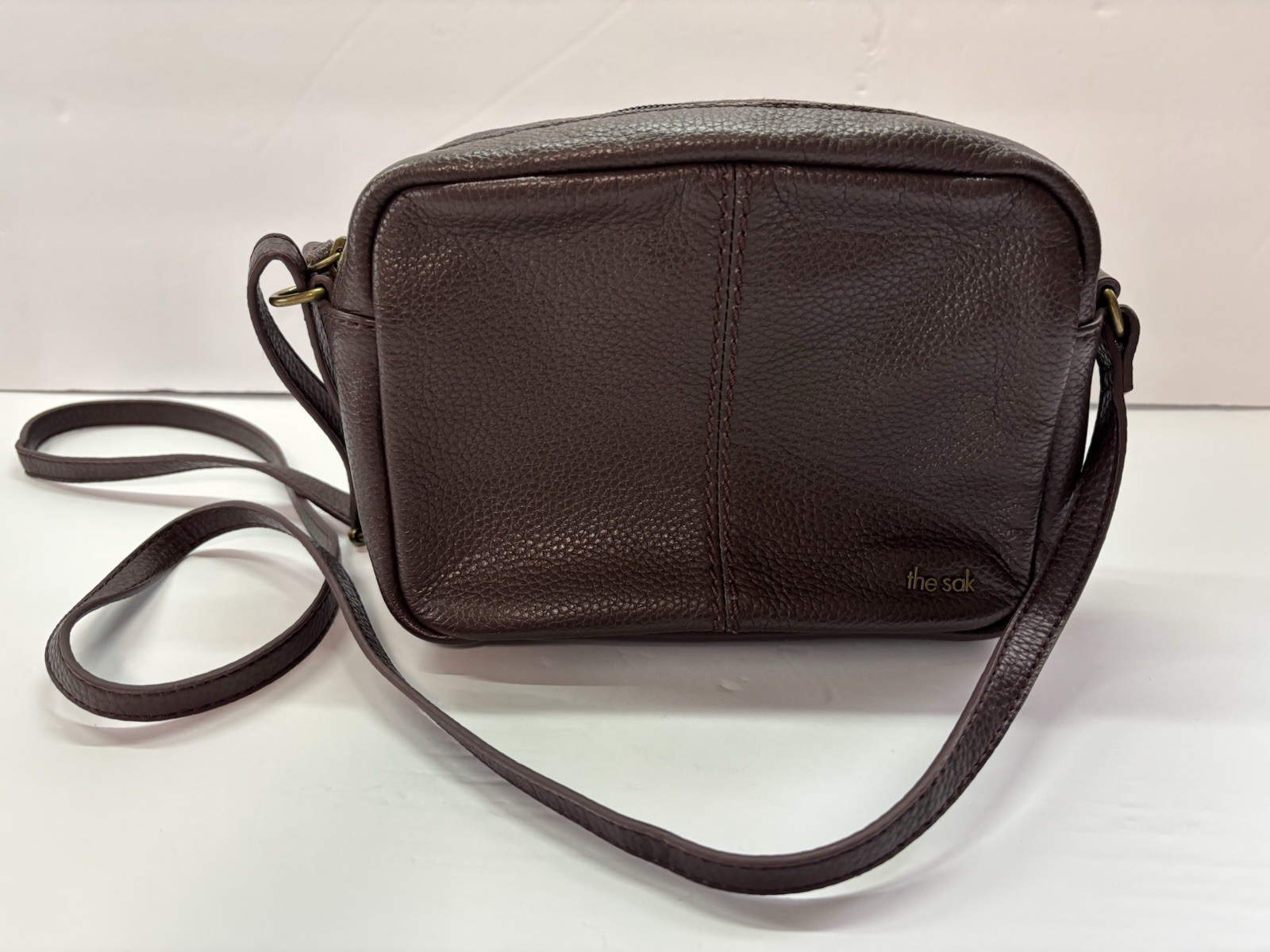 The Sak de young Brown Pebbled 100% leather body Crossbody camera Bag