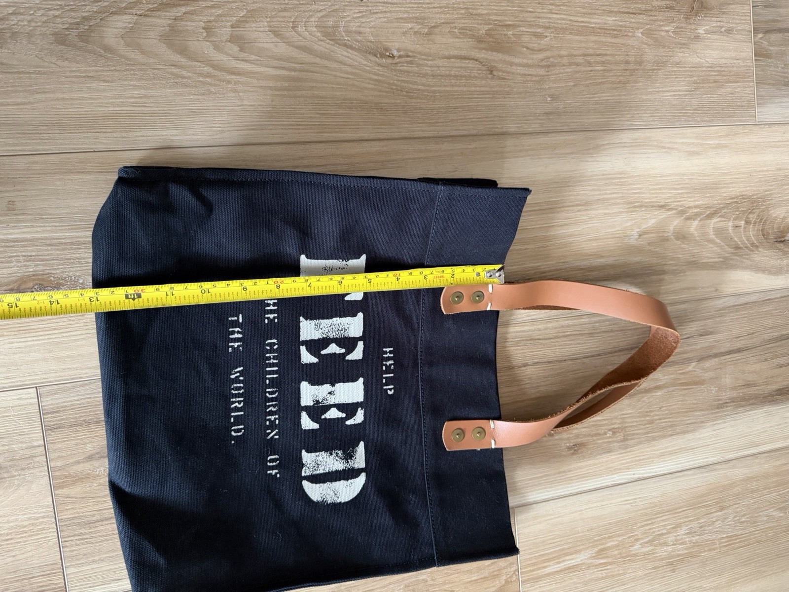 FEED Children Of The World Black Tote Bag Brown Leather Handles 13in HELP