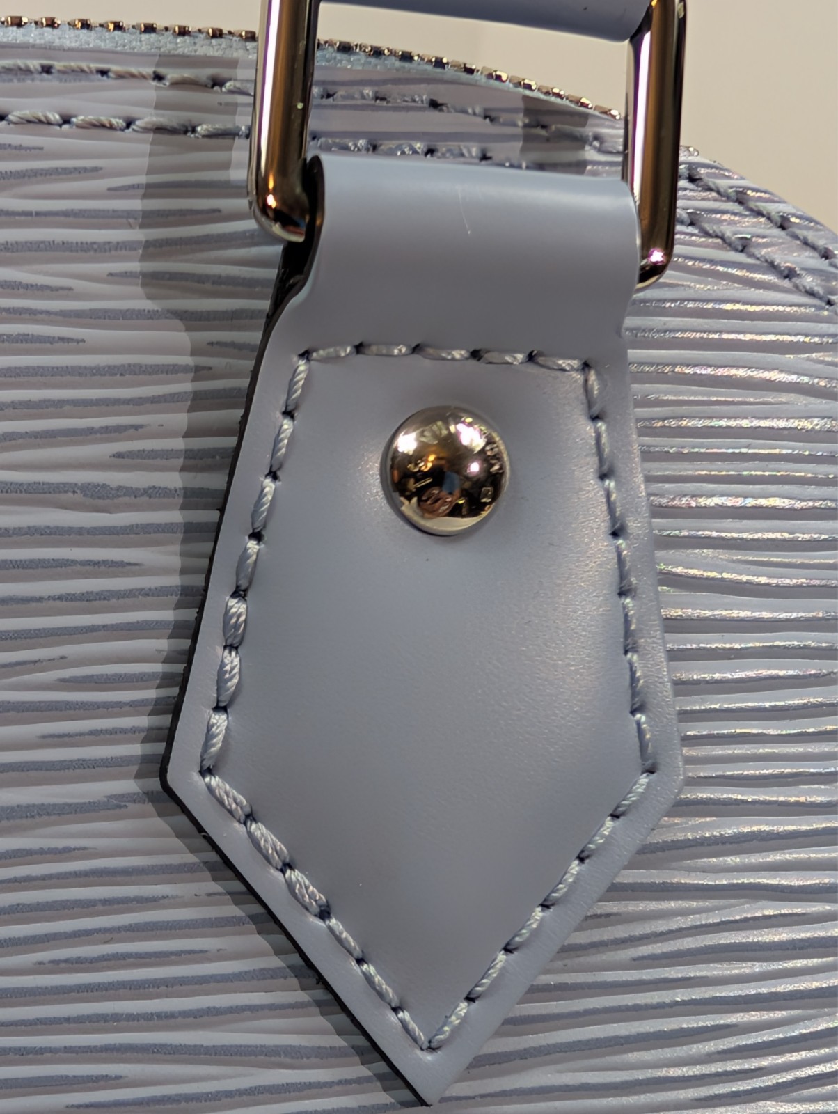 Authenticated Louis Vuitton Bleu Nuage Epi Leather Alma BB Bag