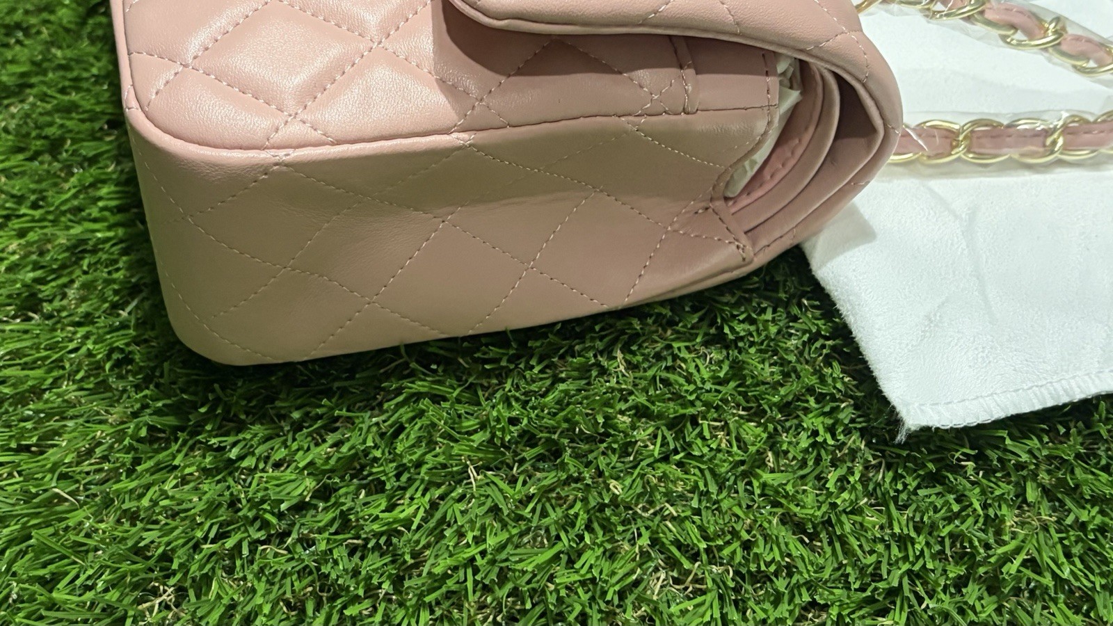 Pink quilted shoulder bag