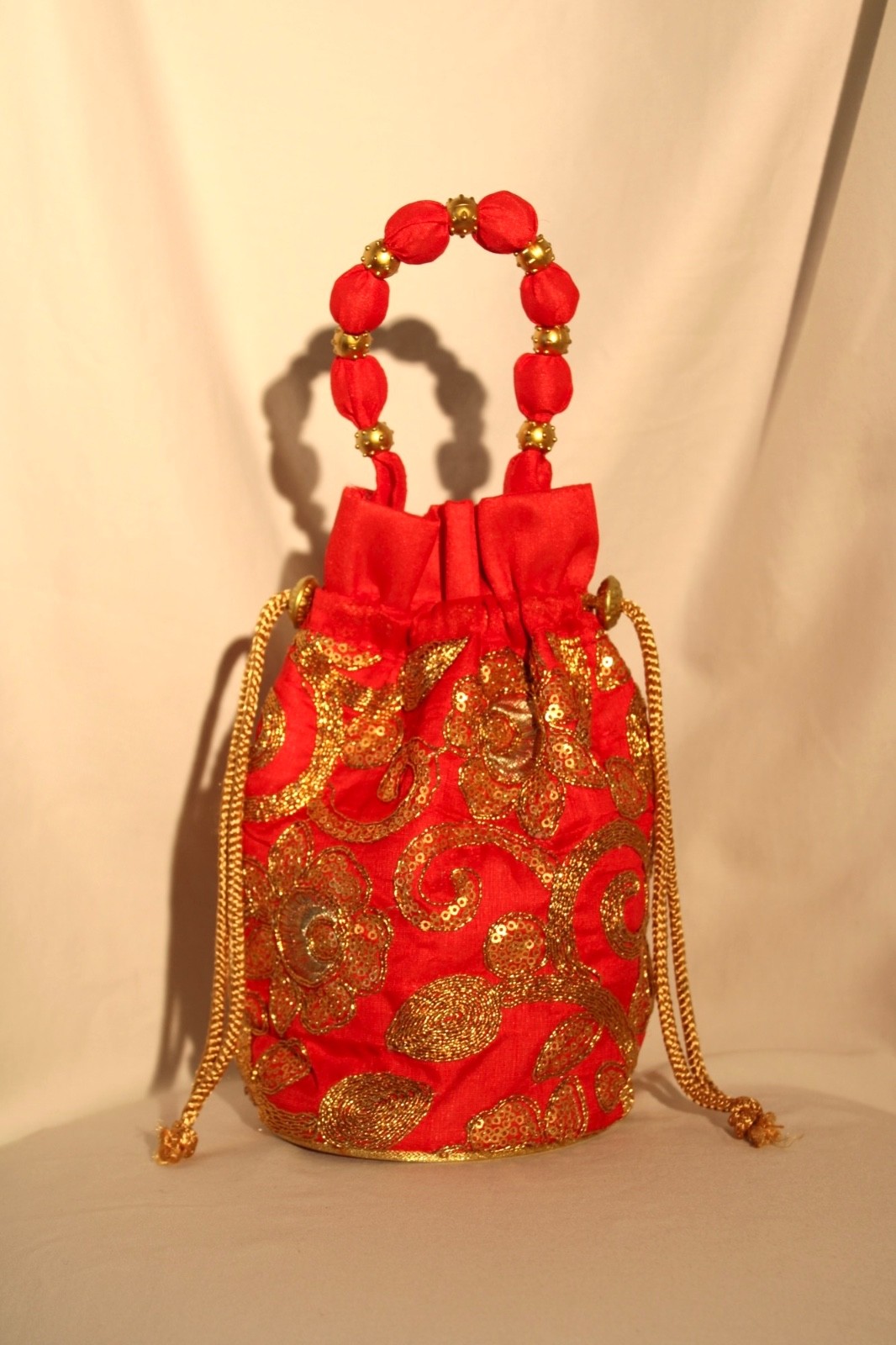 Women’s Red and Gold Jacquard Top Handle Drawstring bag New Without Tag