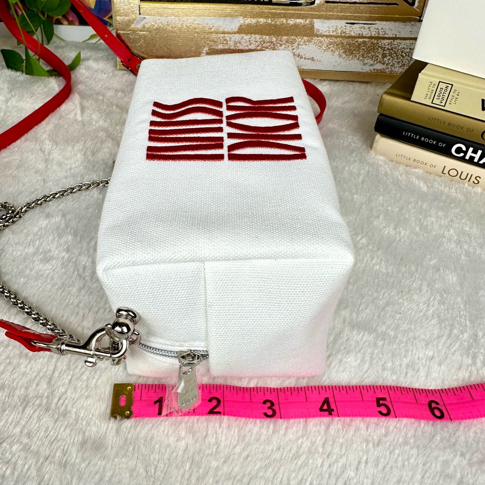 MISS DIOR Beauty line canvas crossbody bag with strap and chain.