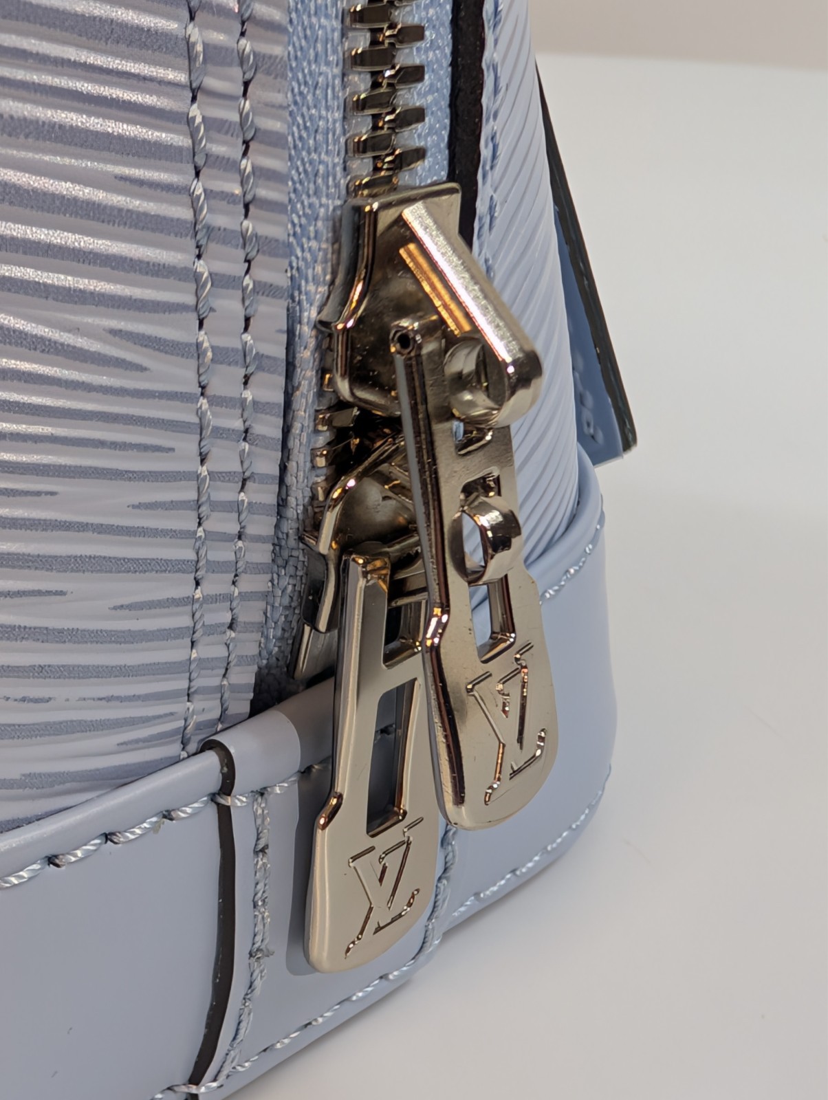 Authenticated Louis Vuitton Bleu Nuage Epi Leather Alma BB Bag