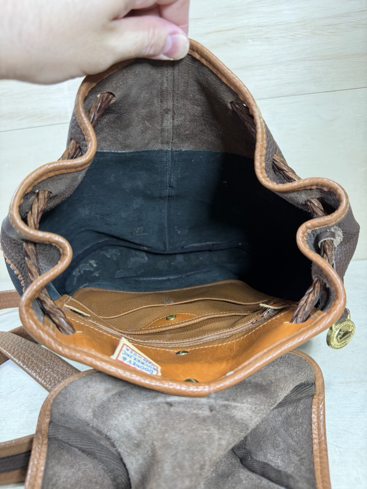 Vintage Dooney & Bourke Black Brown Pebbled Leather Drawstring Backpack Tassels