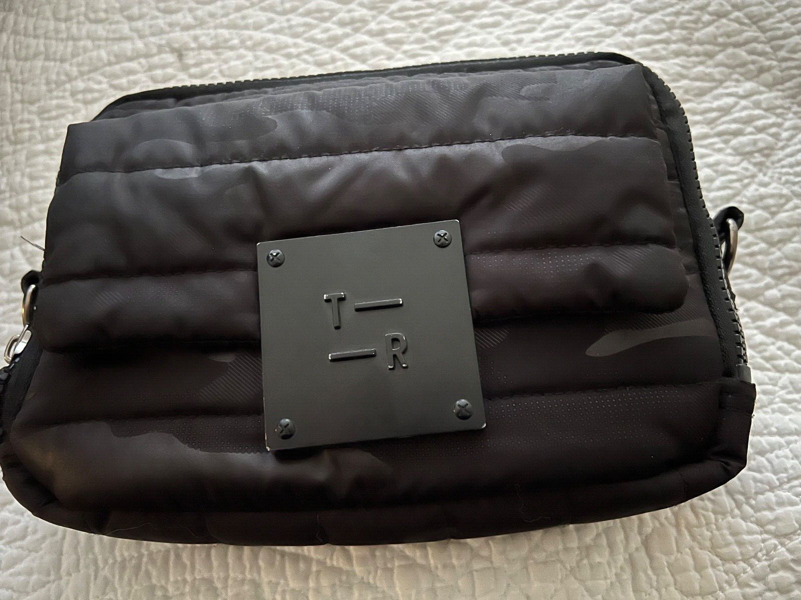 convertible crossbody bag by THINK ROYLN