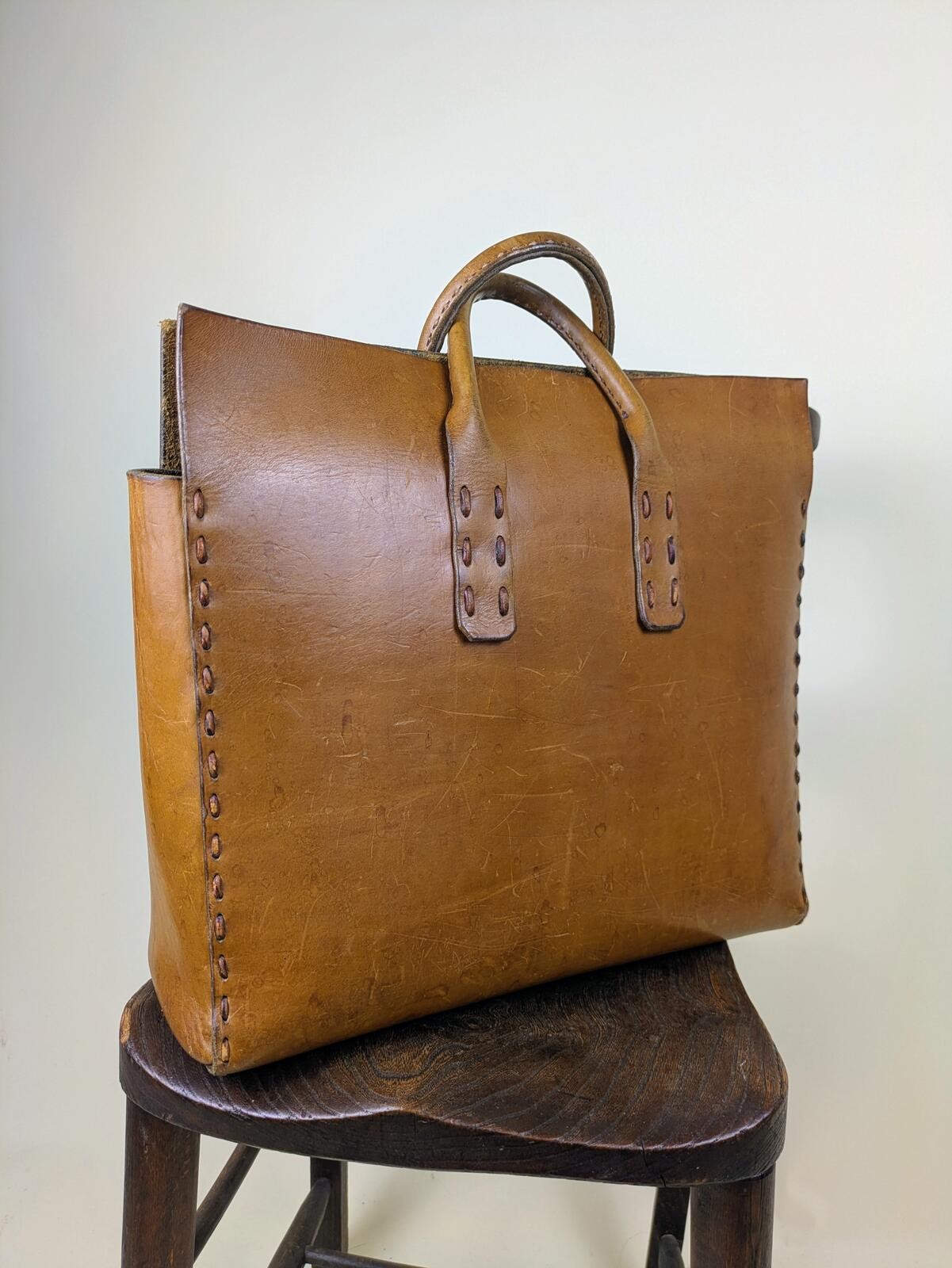 1990’s exaggerated stitch large leather hold all top handle bag