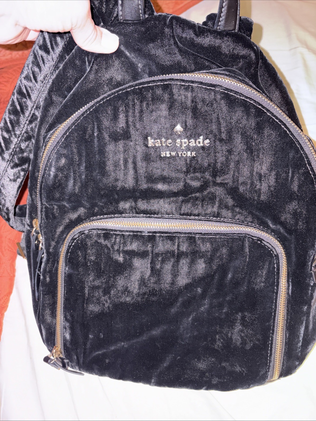 Kate Spade Hartley Black Velvet Backpack with gold zipper details