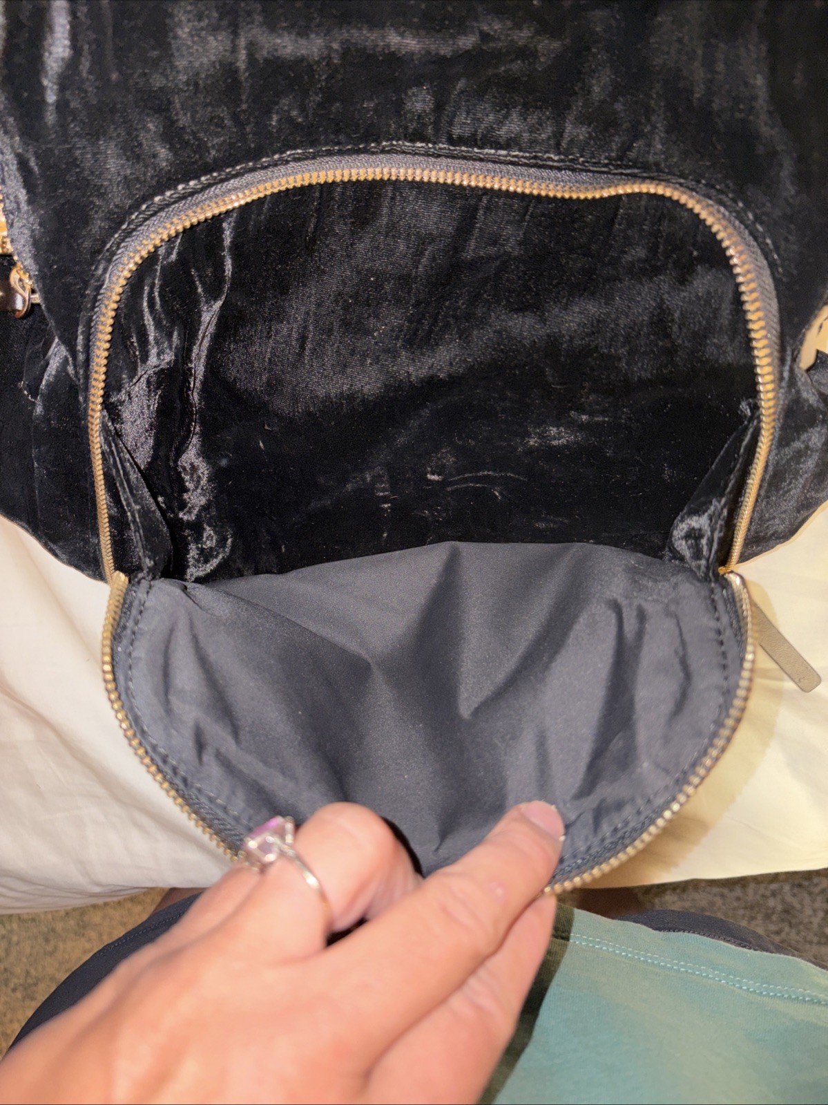 Kate Spade Hartley Black Velvet Backpack with gold zipper details