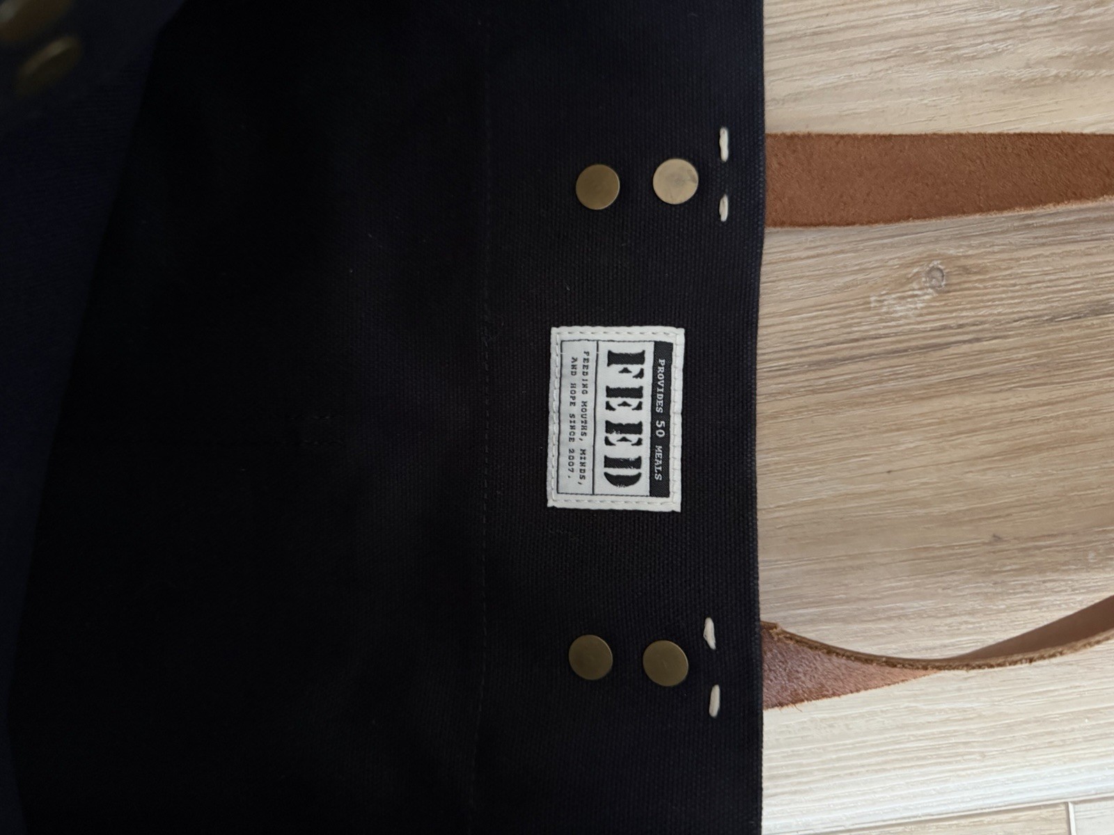 FEED Children Of The World Black Tote Bag Brown Leather Handles 13in HELP