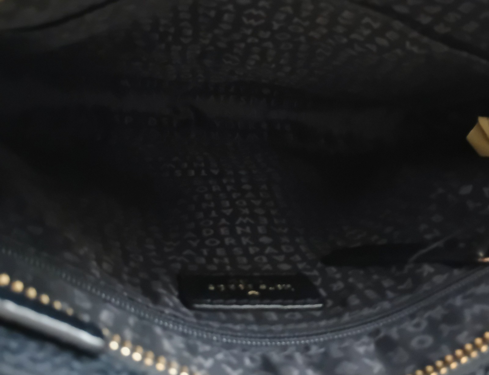 kate spade new york Black Pebbled Crossbody Bag Tassel Zip Pockets Gold