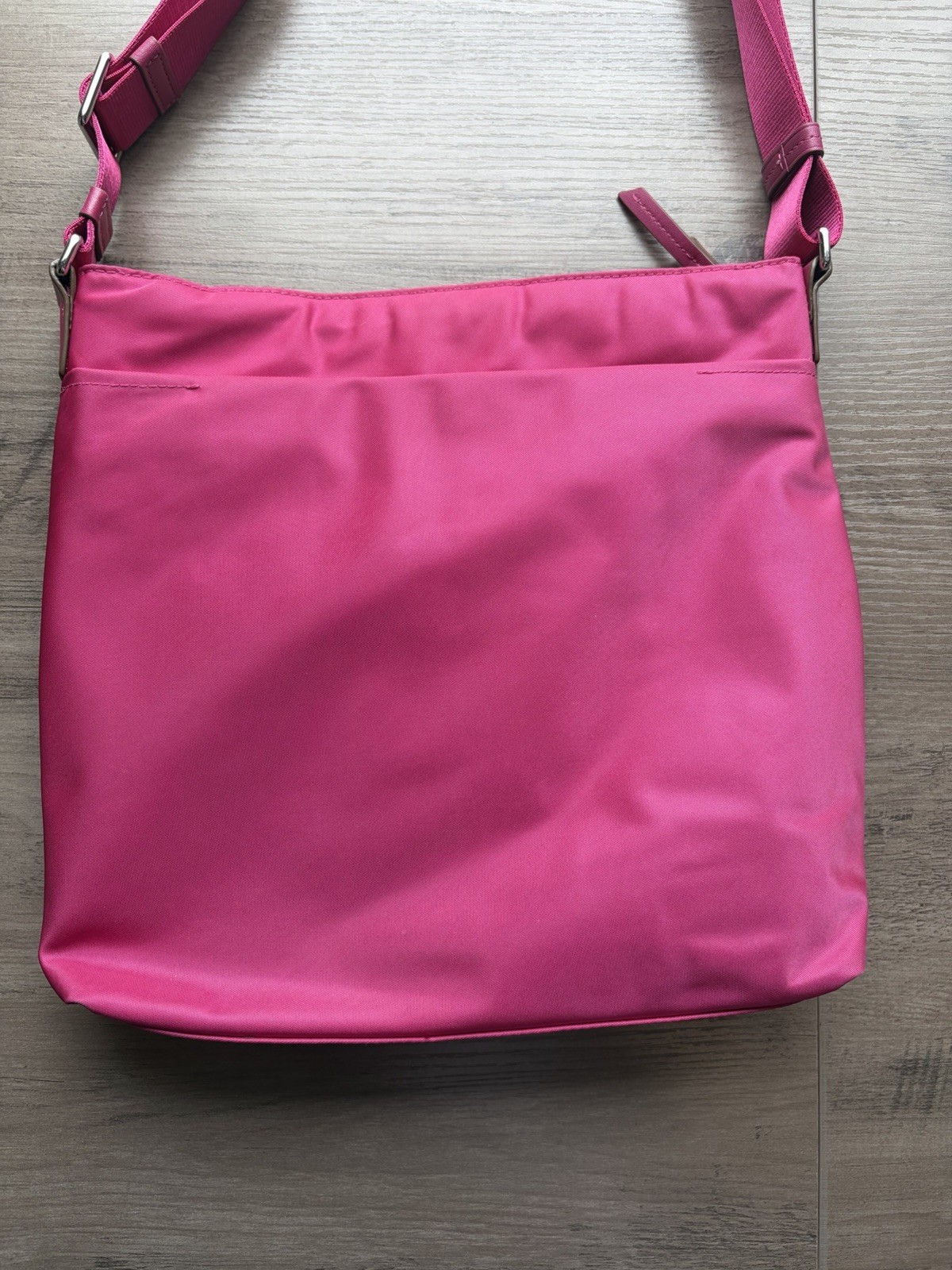 Tumi Pink Crossbody Bag Adjustable Strap Zip Closure Multiple Pockets Lined