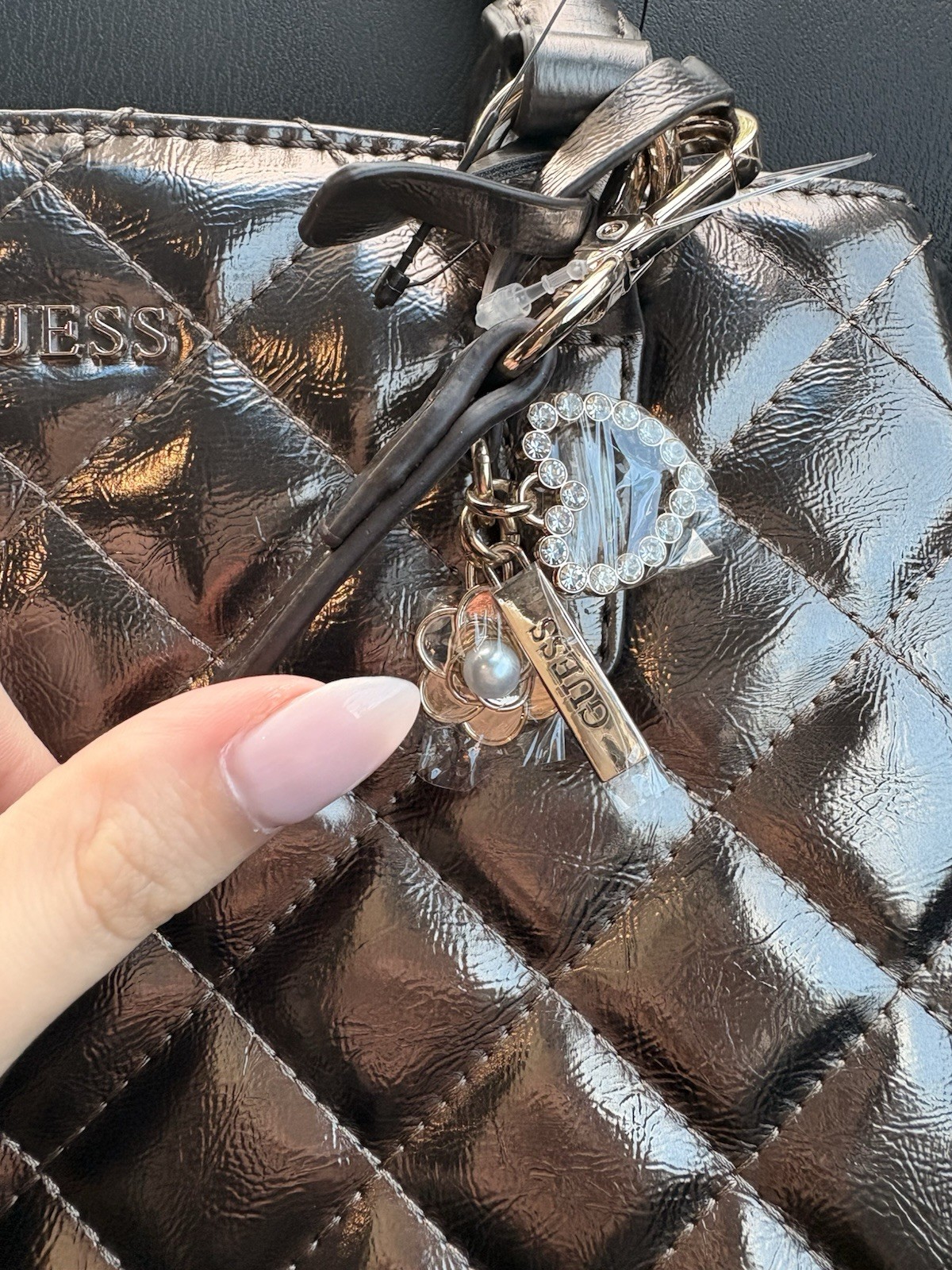 GUESS Black Quilted Medium Satchel Top Handle Bag Zip Gold Hardware Charm Strap