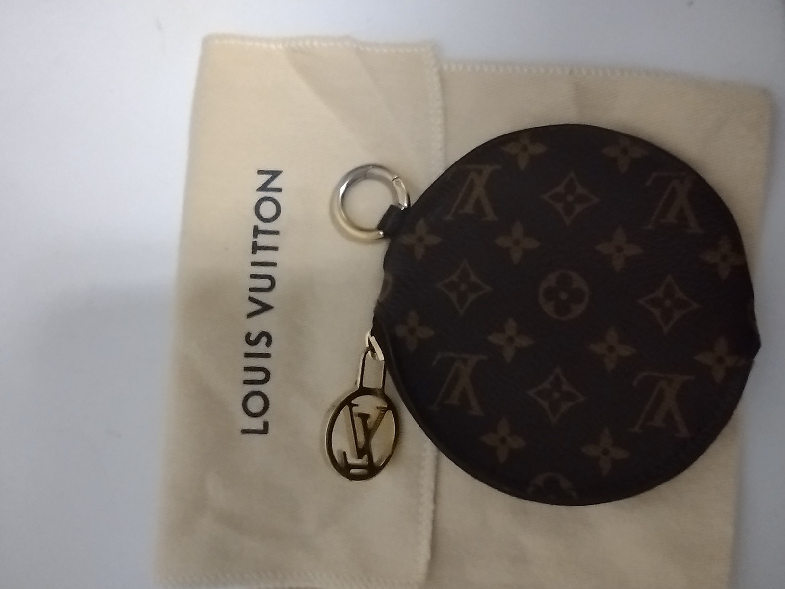Louis Vuitton Coin Pouch from Trio Pouch Set.