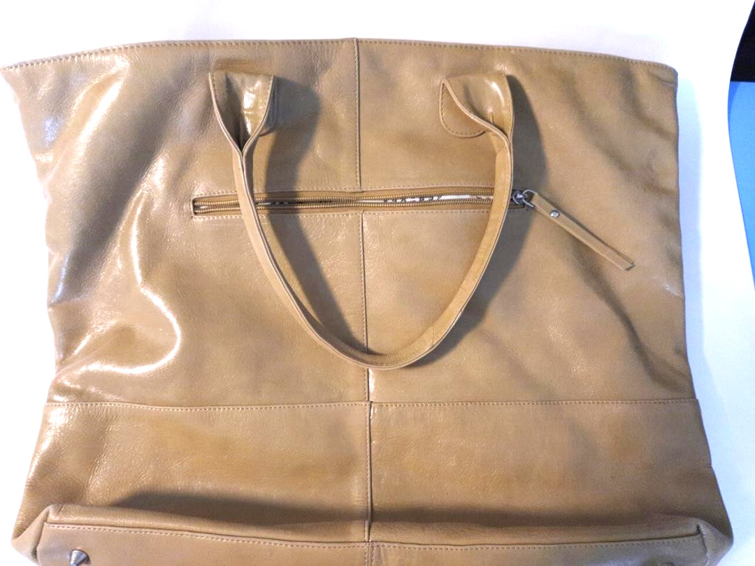 Oversized Tote Bag – Goldish-tan color/17″ wide x 15.5″ high Possibly Leather