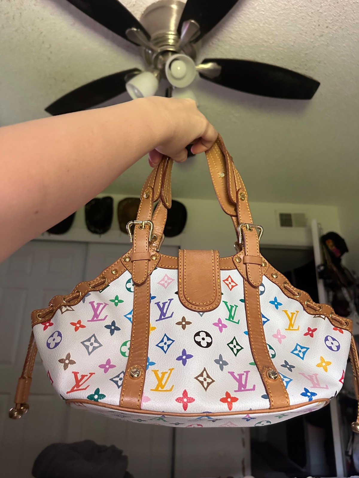 Louis Vuitton Murakami Theda purse. Red interior.