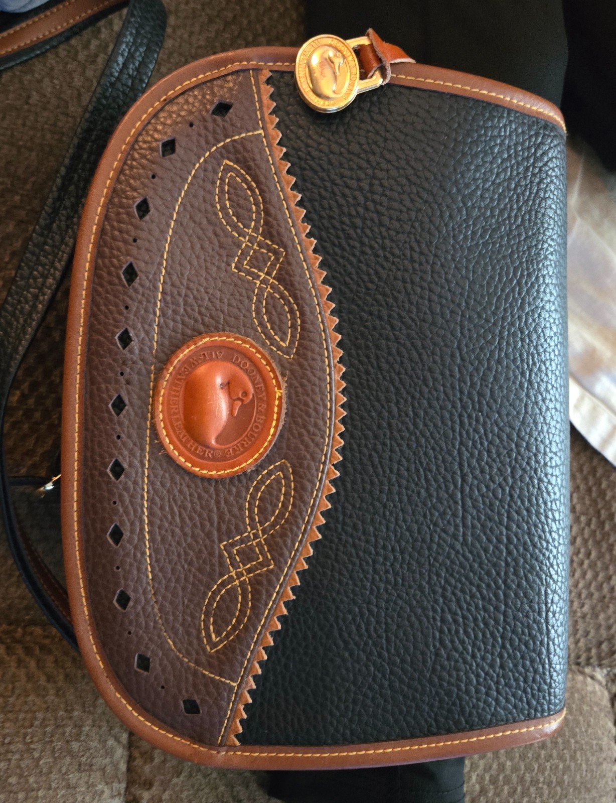Dooney and Bourke Handbag, slightly used, Western Style brown and black