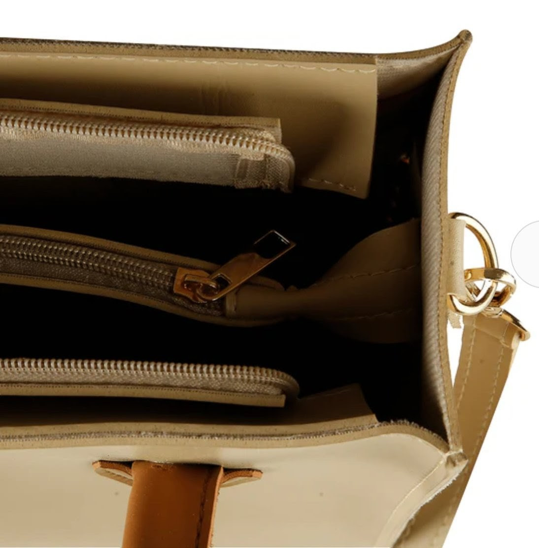 Soft, beautiful beige handbag with brown handles and tassels