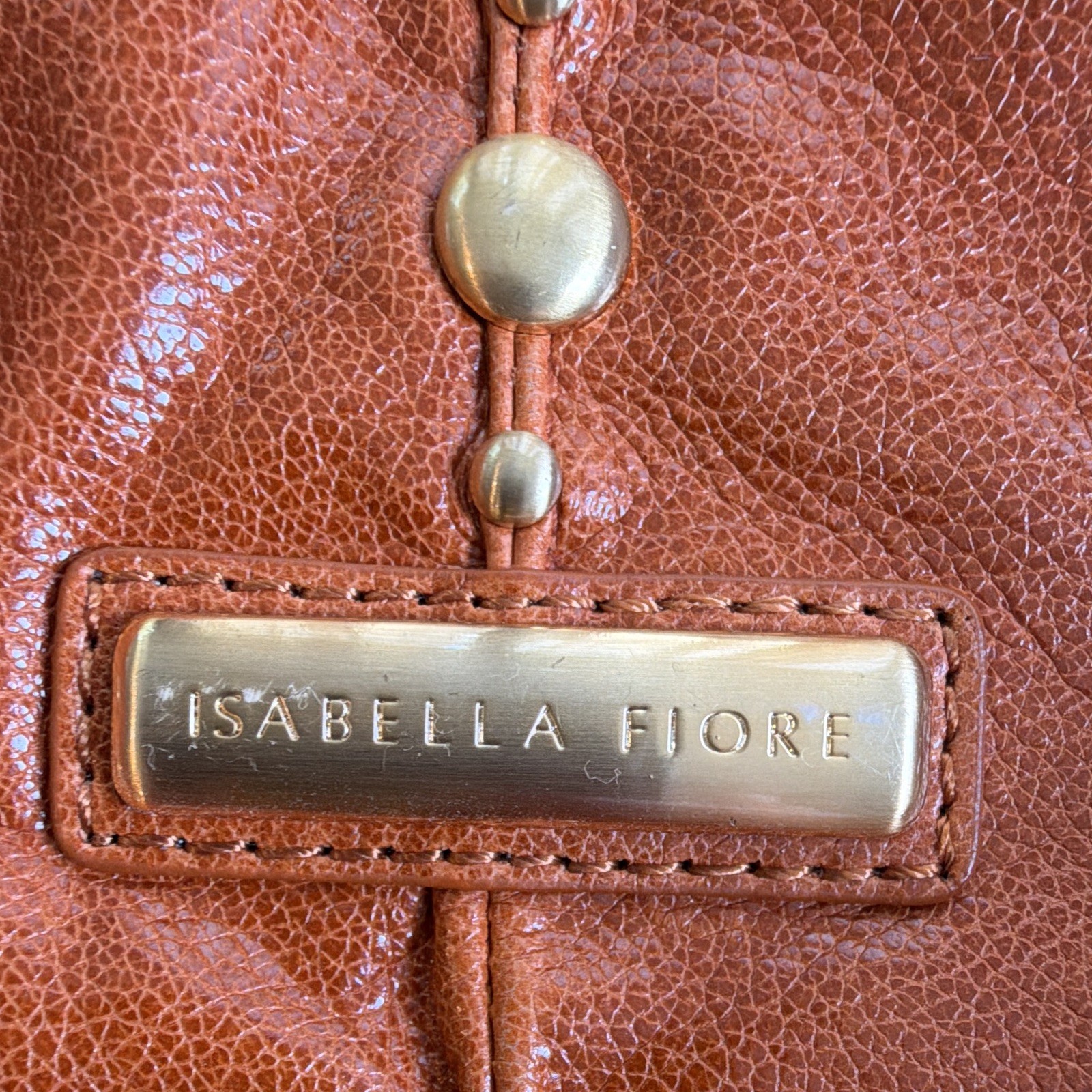 Isabella  Fiore Brown Studded Leather Drawstring Shoulder Bag – Tasseled Strap