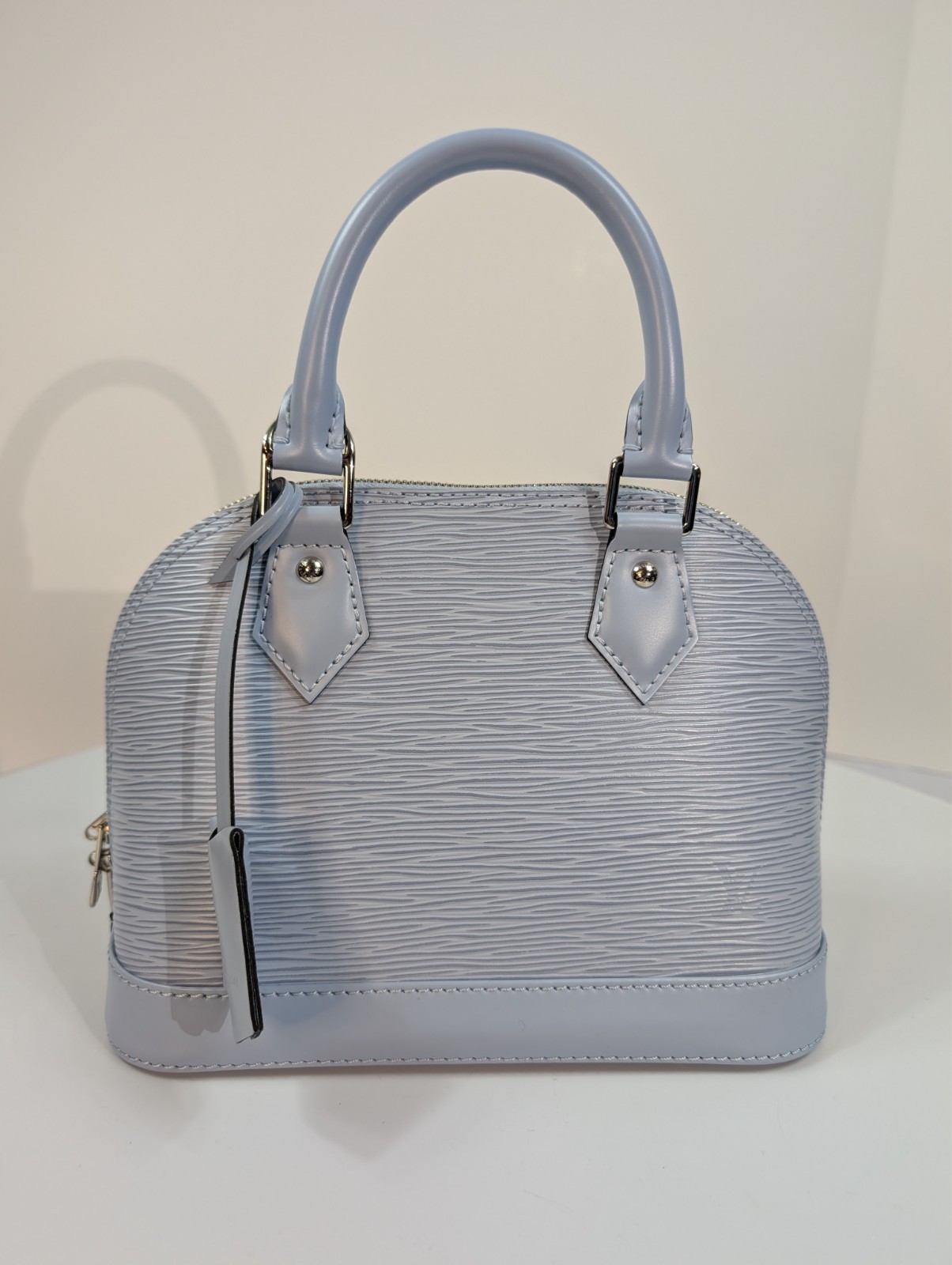 Authenticated Louis Vuitton Bleu Nuage Epi Leather Alma BB Bag